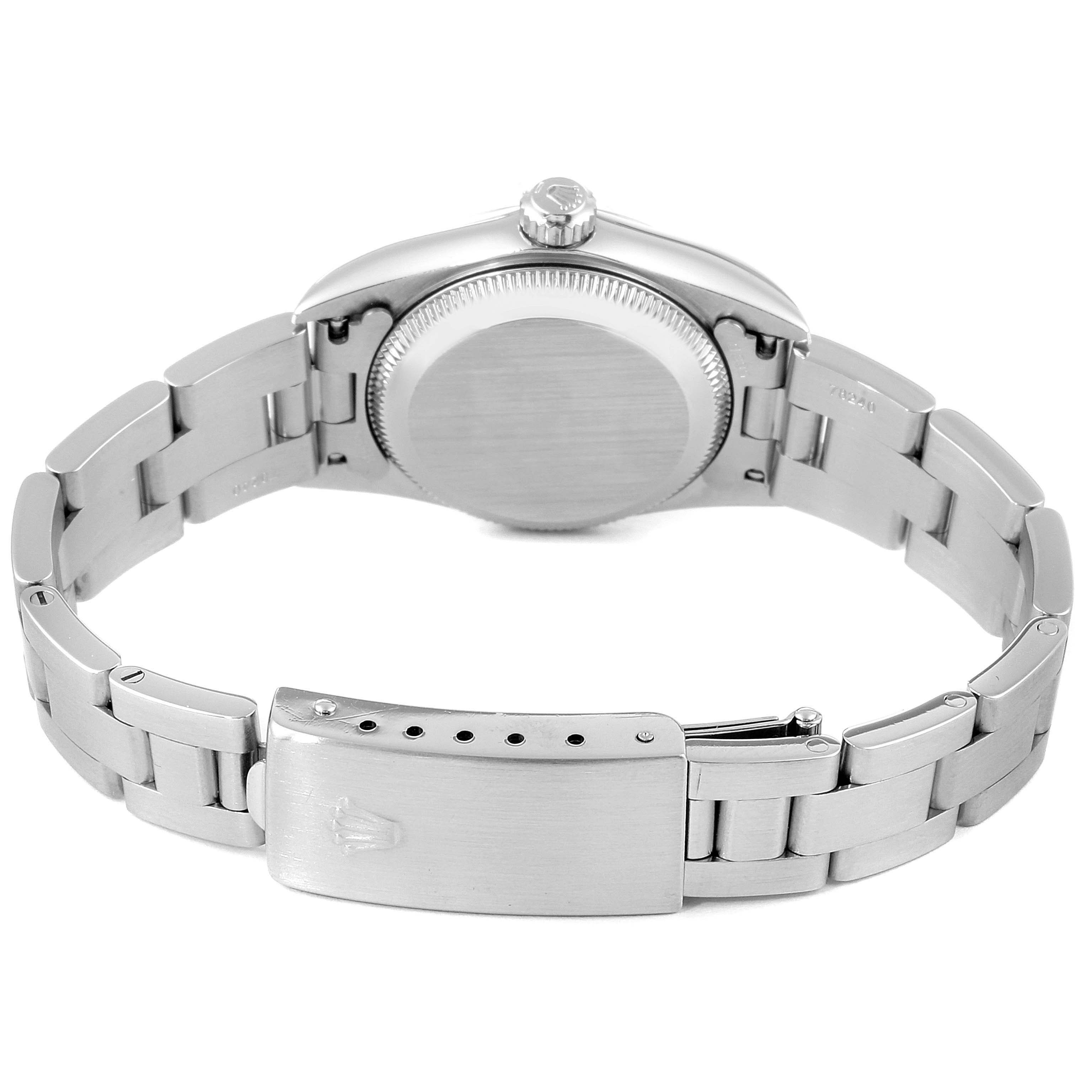 The image shows the back view of the Rolex Oyster Perpetual 76080 Women
s Stainless Steel Blue Dial 76080 Women
s Stainless Steel Blue Dial watch, highlighting the case back and the bracelet clasp.