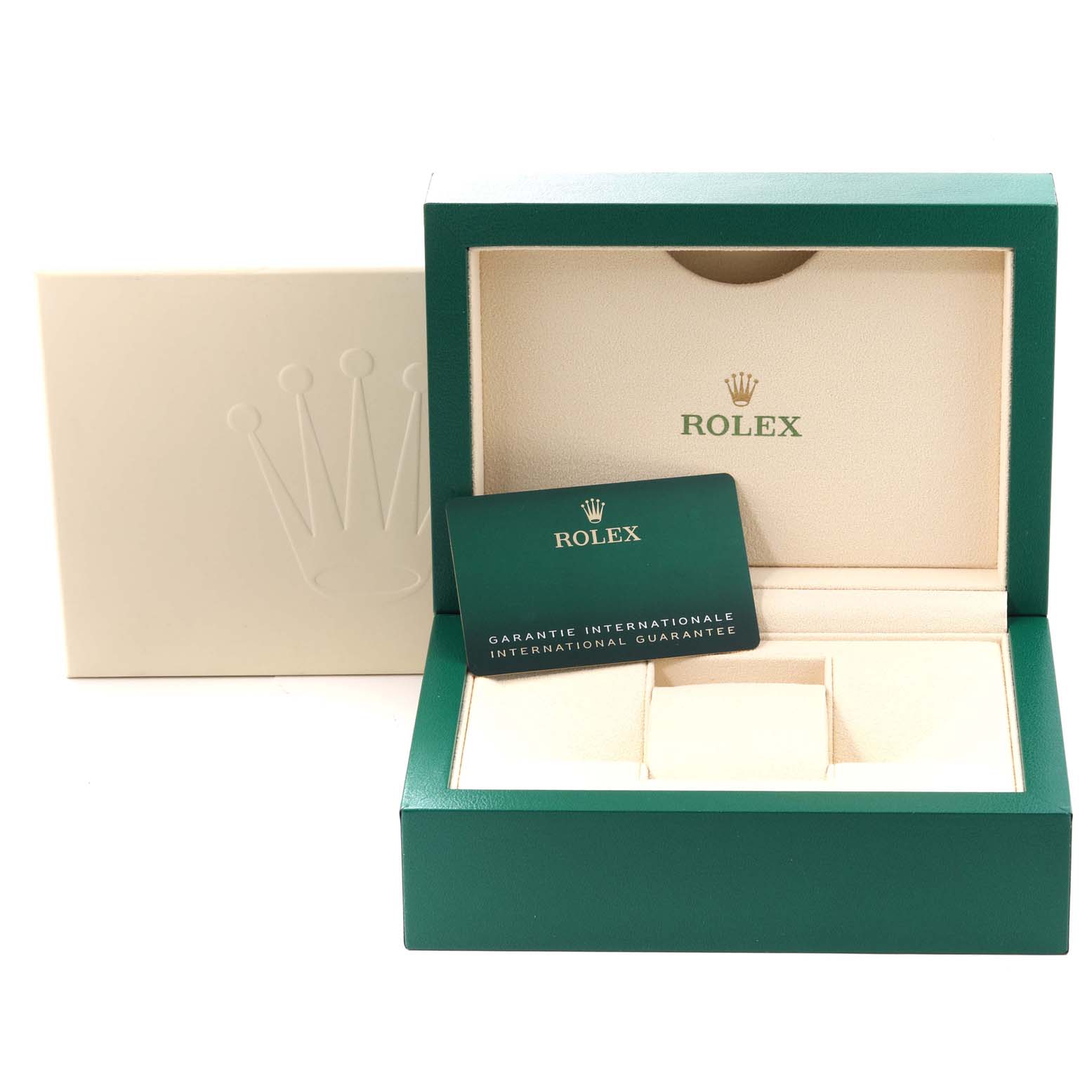 The image shows packaging for the Rolex Oyster Perpetual 124300 Men
s Stainless Steel Black Dial 124300 Men
s Stainless Steel Black Dial watch, including a green presentation box, an outer box, and an international guarantee card.