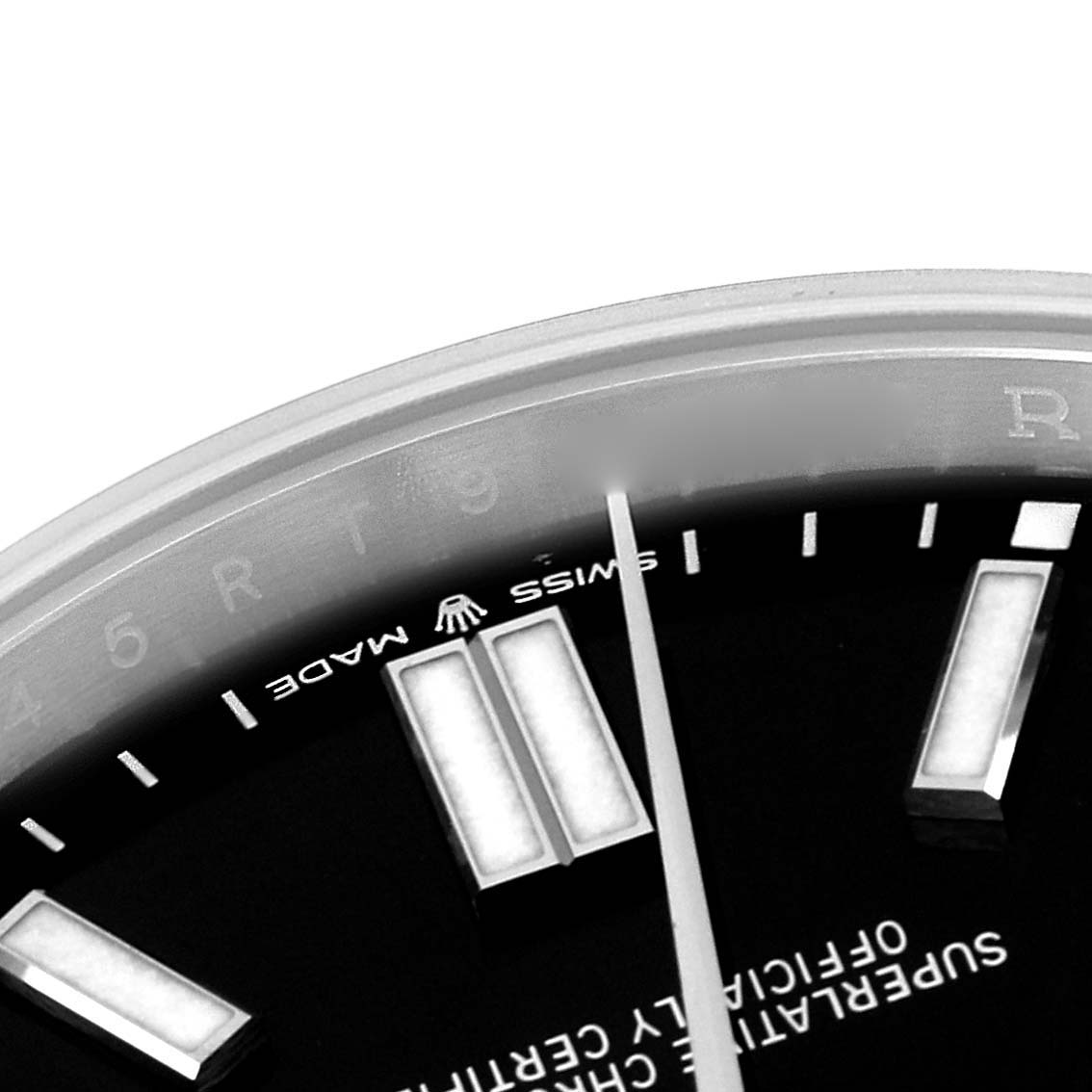 The image shows a close-up of the dial and hands of a Rolex Oyster Perpetual 124300 Men
s Stainless Steel Black Dial 124300 Men
s Stainless Steel Black Dial watch.