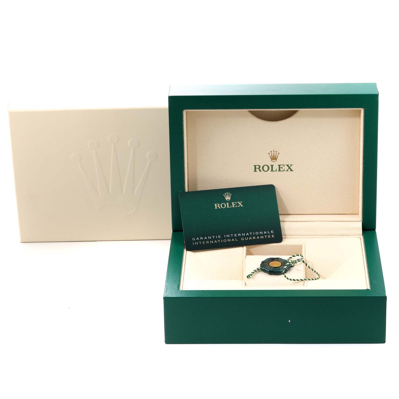 The image shows the open box, guarantee card, and tag for the Rolex Oyster Perpetual 124300 Men
s Stainless Steel Blue Dial 124300 Men
s Stainless Steel Blue Dial watch, viewed from the front.