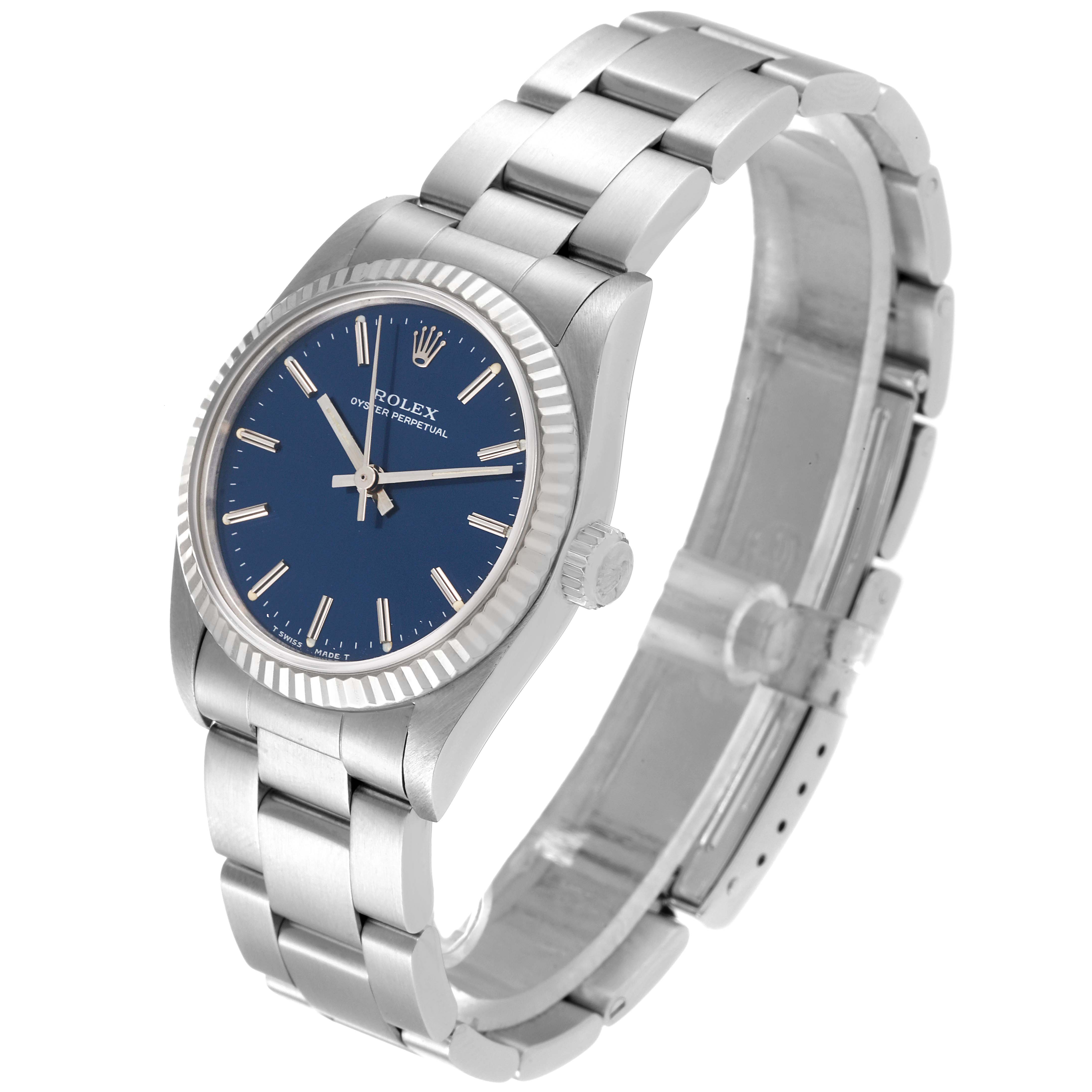 The Rolex Mid-Size 67514 Women
s Stainless Steel Blue Dial 67514 Women
s Stainless Steel Blue Dial model is shown from a slight angle, displaying the face, crown, bracelet, and clasp.