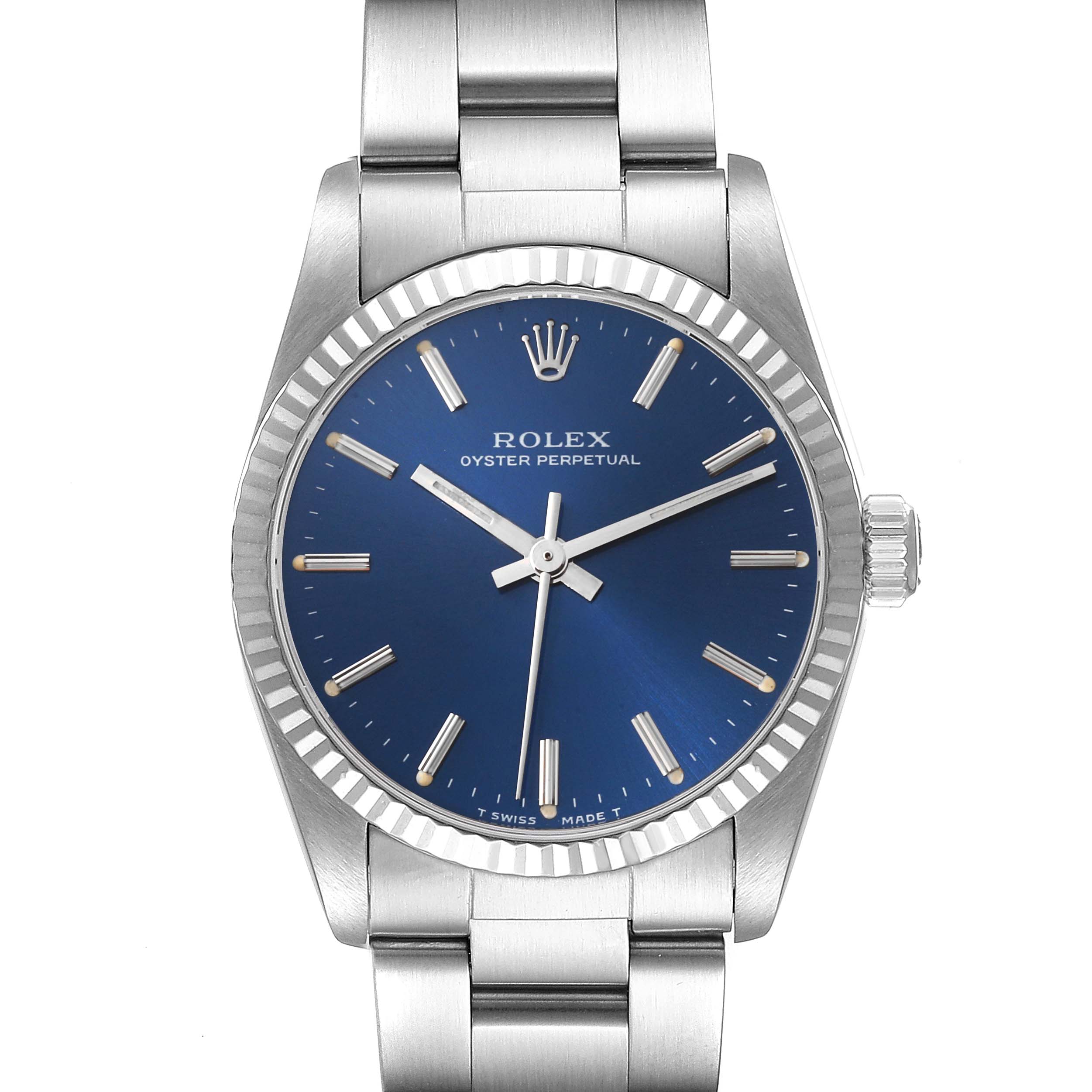 This image shows a front view of a Rolex Oyster Perpetual Mid-Size watch, displaying the face, bezel, crown, and part of the bracelet.