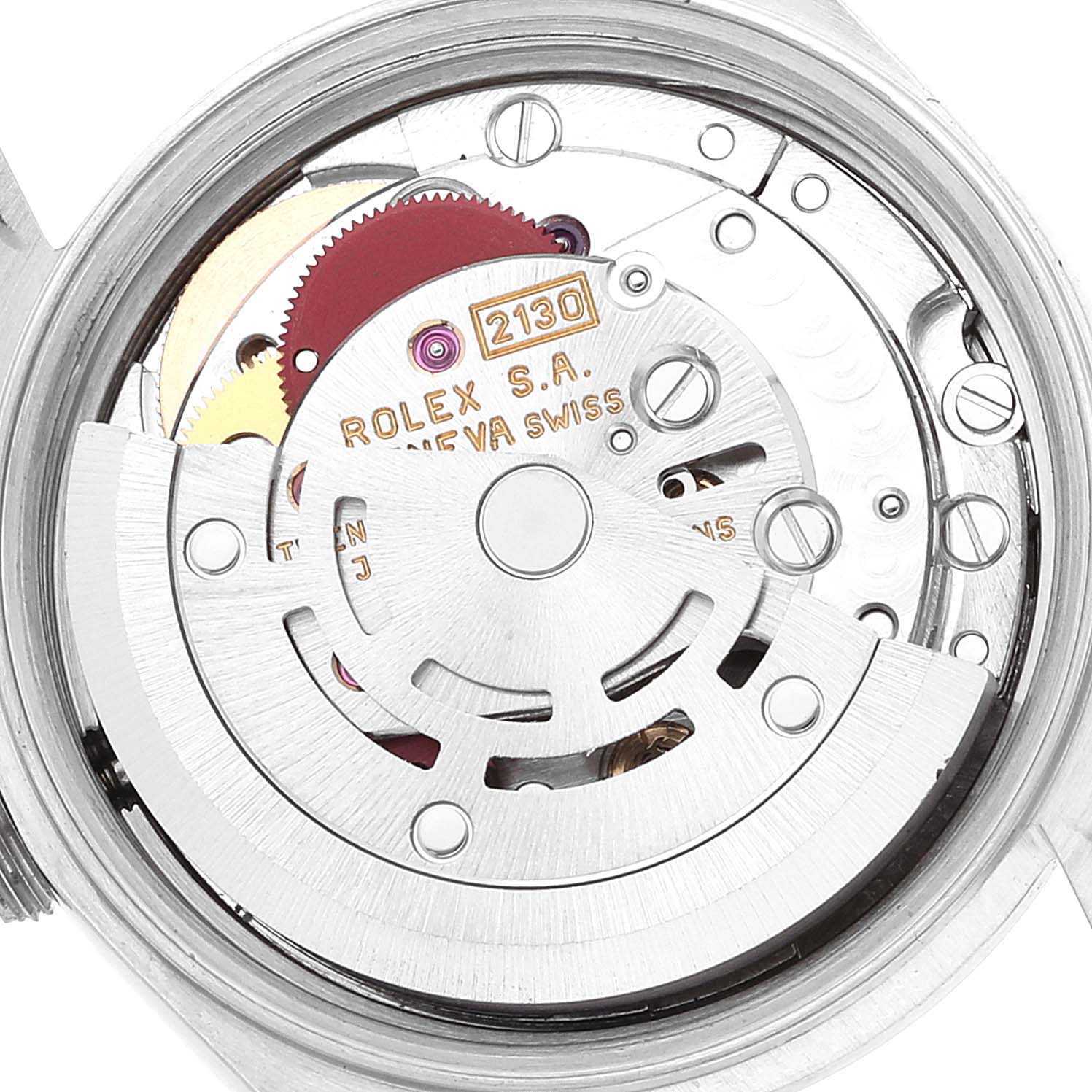 The image shows an internal view of the movement mechanism of a Rolex Oyster Perpetual 67180 Women
s Stainless Steel Pink Dial 67180 Women
s Stainless Steel Pink Dial watch.