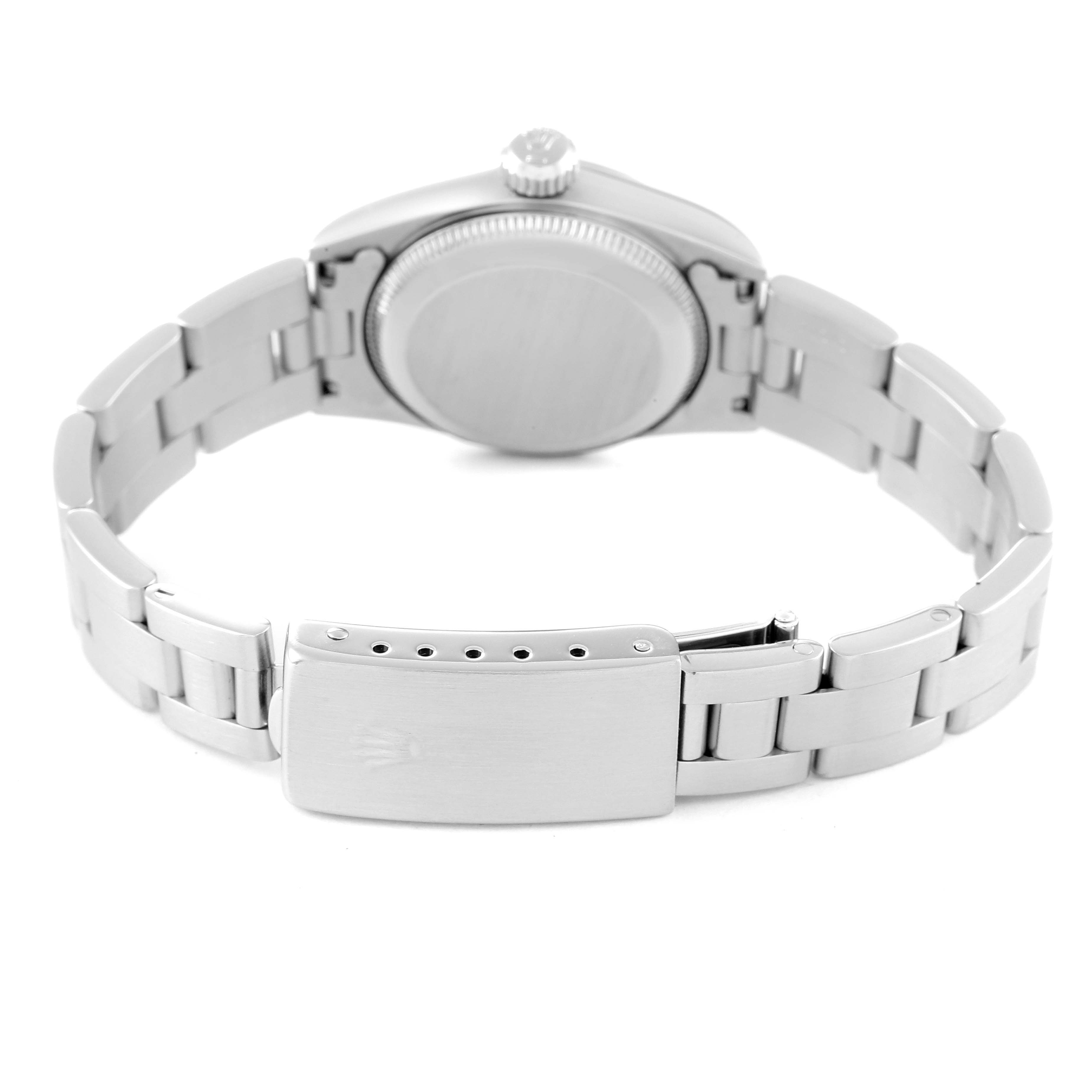 This image shows the back view of a Rolex Oyster Perpetual 67230 Women
s Stainless Steel Pink Dial 67230 Women
s Stainless Steel Pink Dial watch, focusing on the clasp and bracelet links.