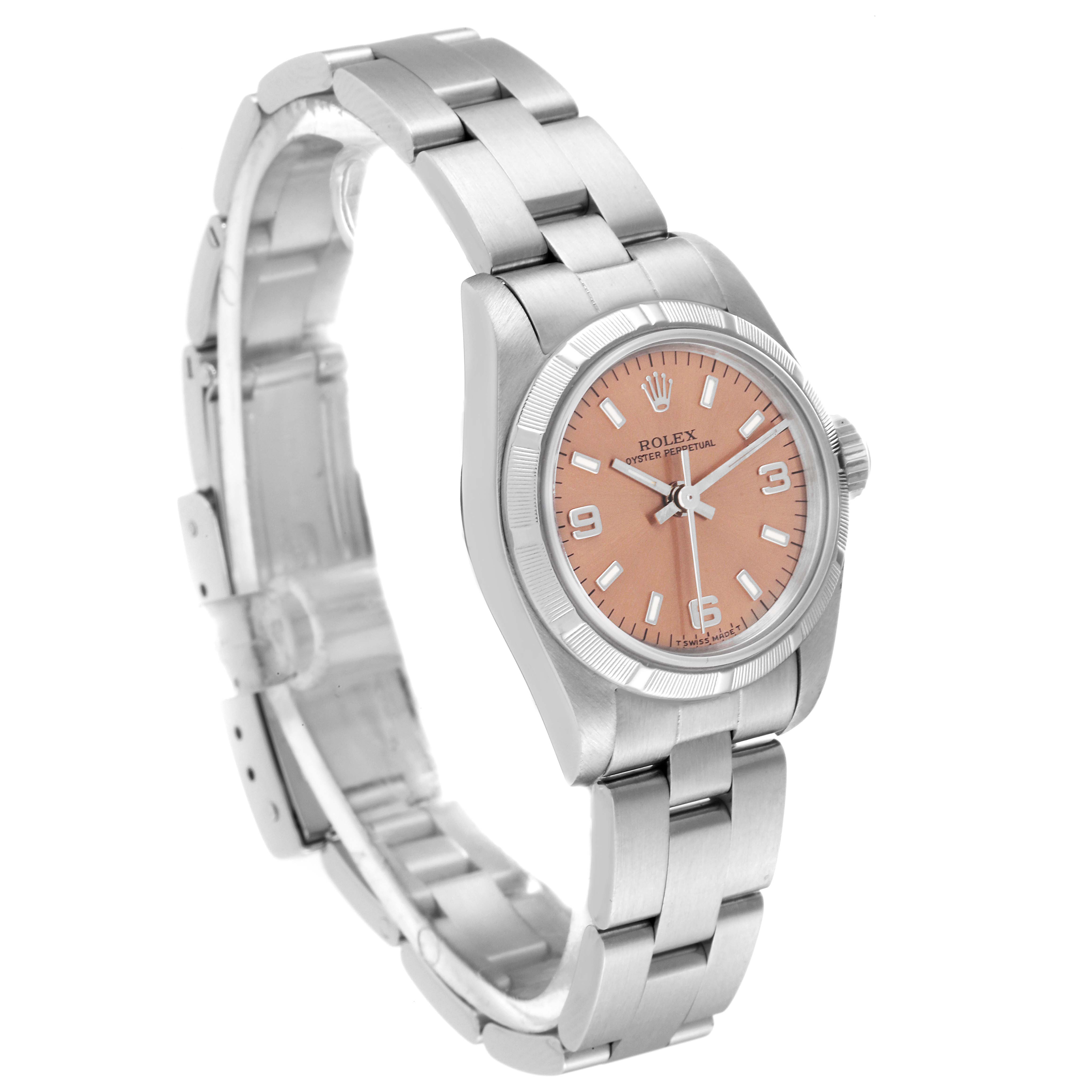 The image shows a side angle of the Rolex Oyster Perpetual 67230 Women
s Stainless Steel Pink Dial 67230 Women
s Stainless Steel Pink Dial watch with a pink dial and a stainless steel bracelet.