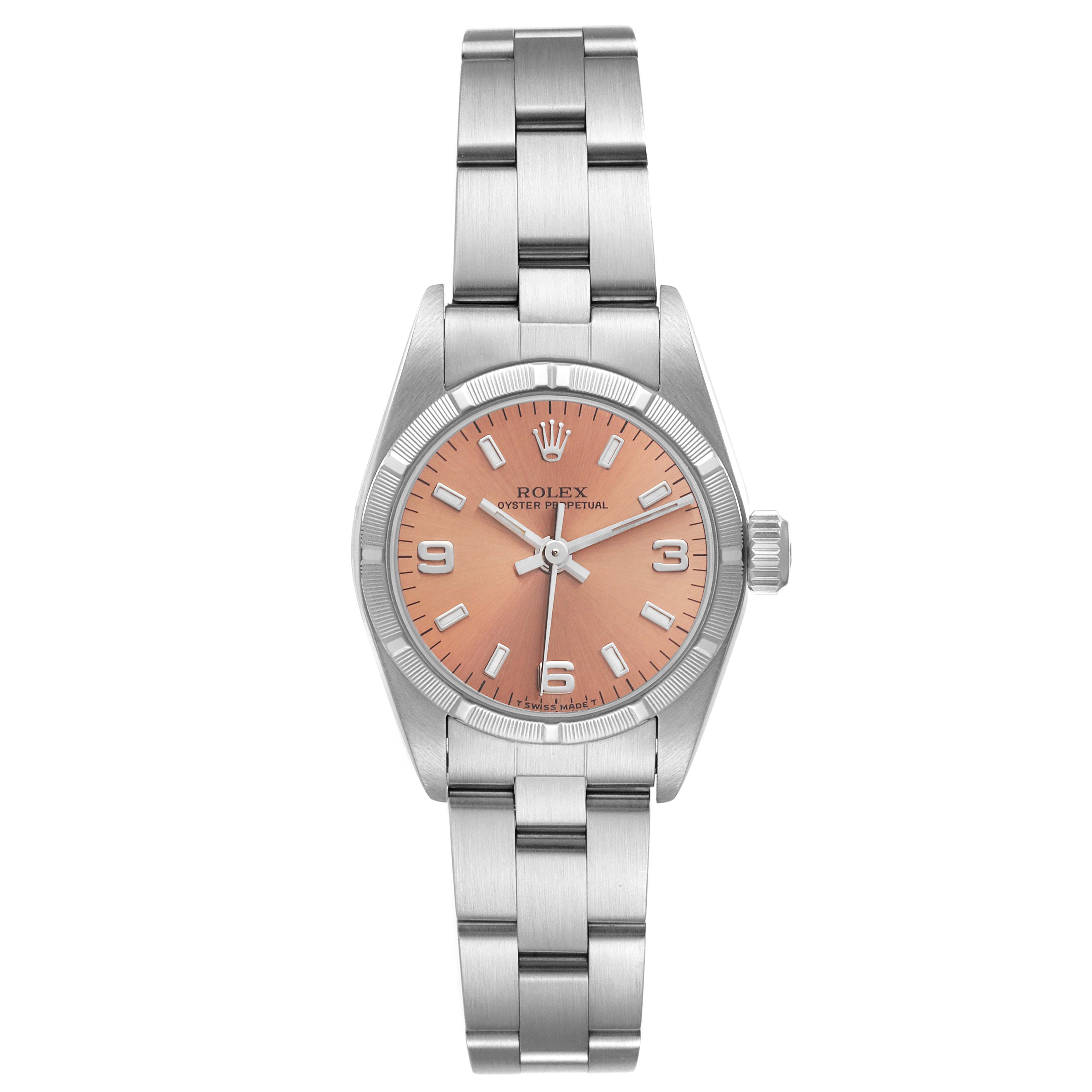 The image shows a Rolex Oyster Perpetual 67230 Women
s Stainless Steel Pink Dial 67230 Women
s Stainless Steel Pink Dial watch from a front angle, displaying its face, case, and bracelet.