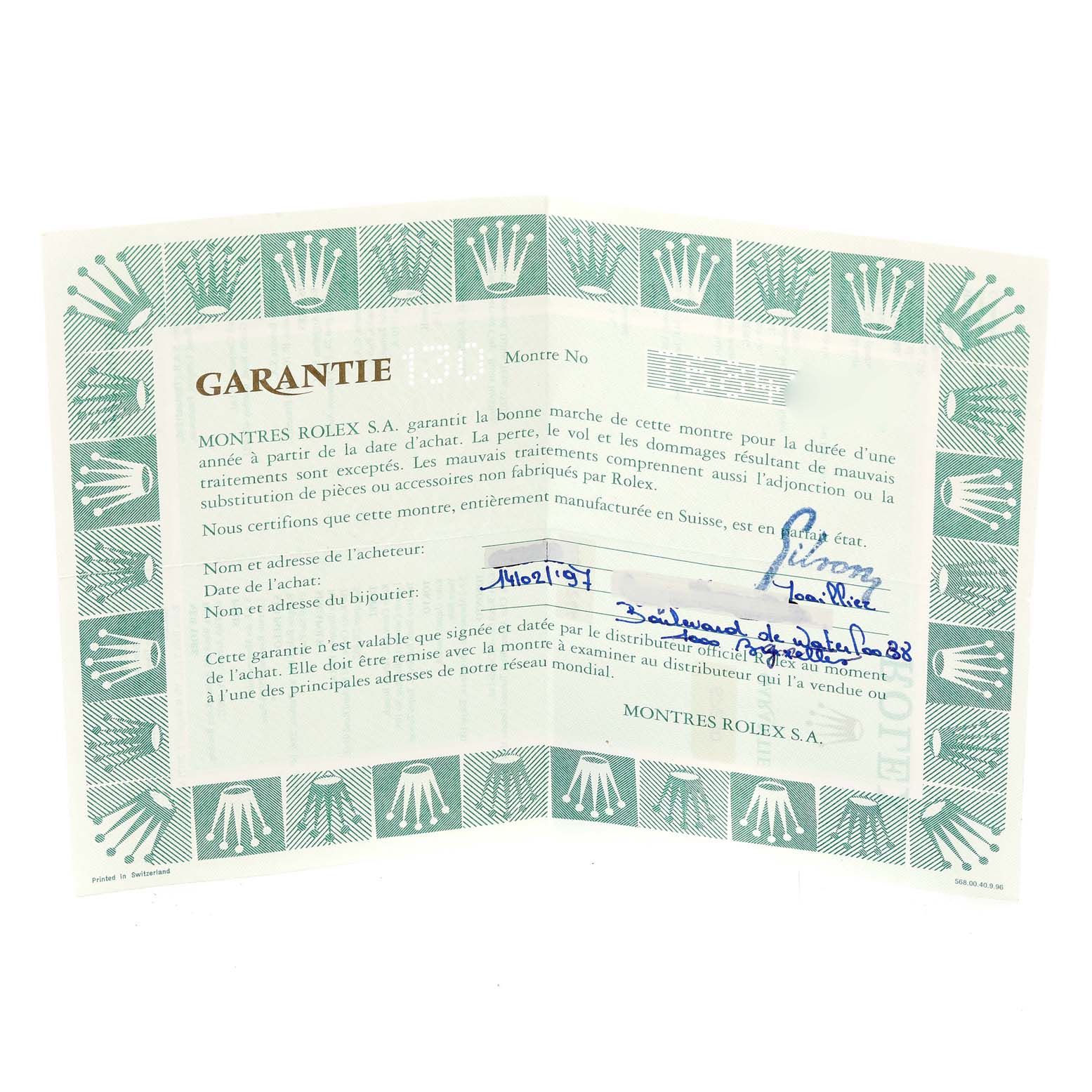 The image shows a warranty certificate for a Rolex Oyster Perpetual 67230 Women
s Stainless Steel Pink Dial 67230 Women
s Stainless Steel Pink Dial watch, displayed at a slight angle.