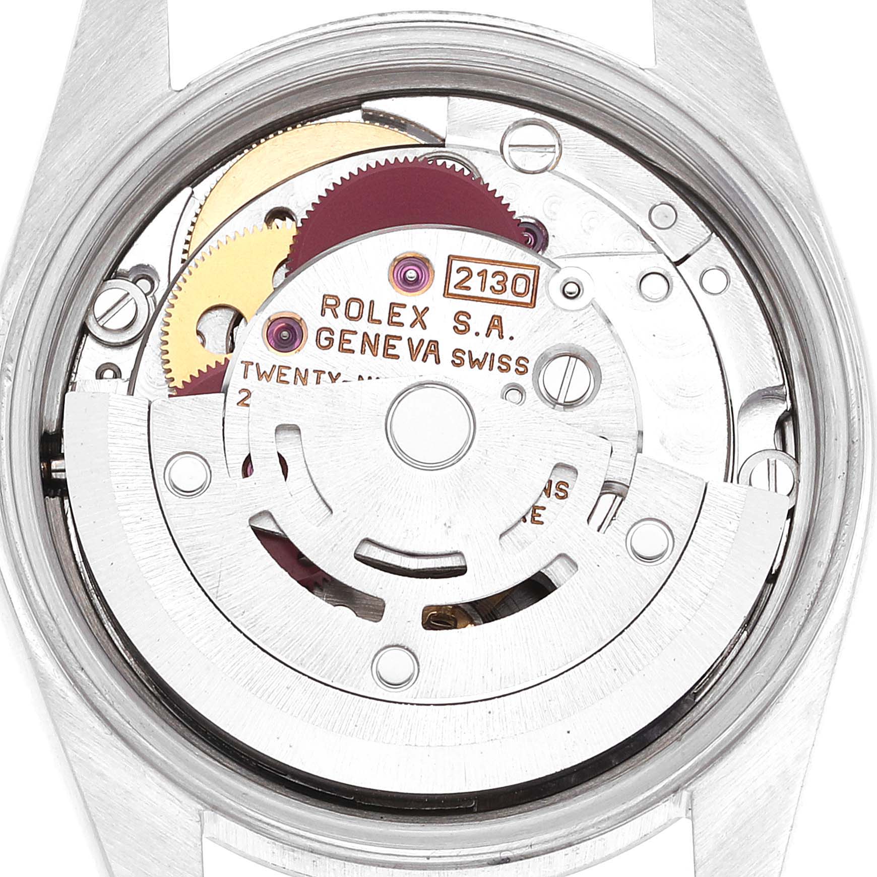 This image shows the inner mechanics and movement of a Rolex Oyster Perpetual 67230 Women
s Stainless Steel Pink Dial 67230 Women
s Stainless Steel Pink Dial watch from a top-down angle.