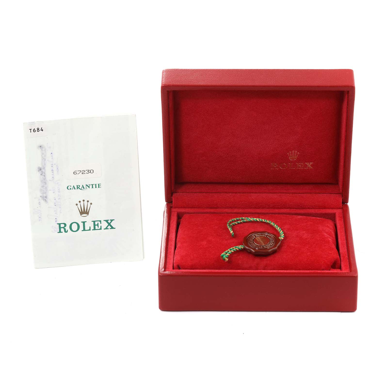 The image shows a Rolex Oyster Perpetual 67230 Women
s Stainless Steel Pink Dial 67230 Women
s Stainless Steel Pink Dial box, a warranty card, and a green and red Rolex seal, all viewed from a front angle.