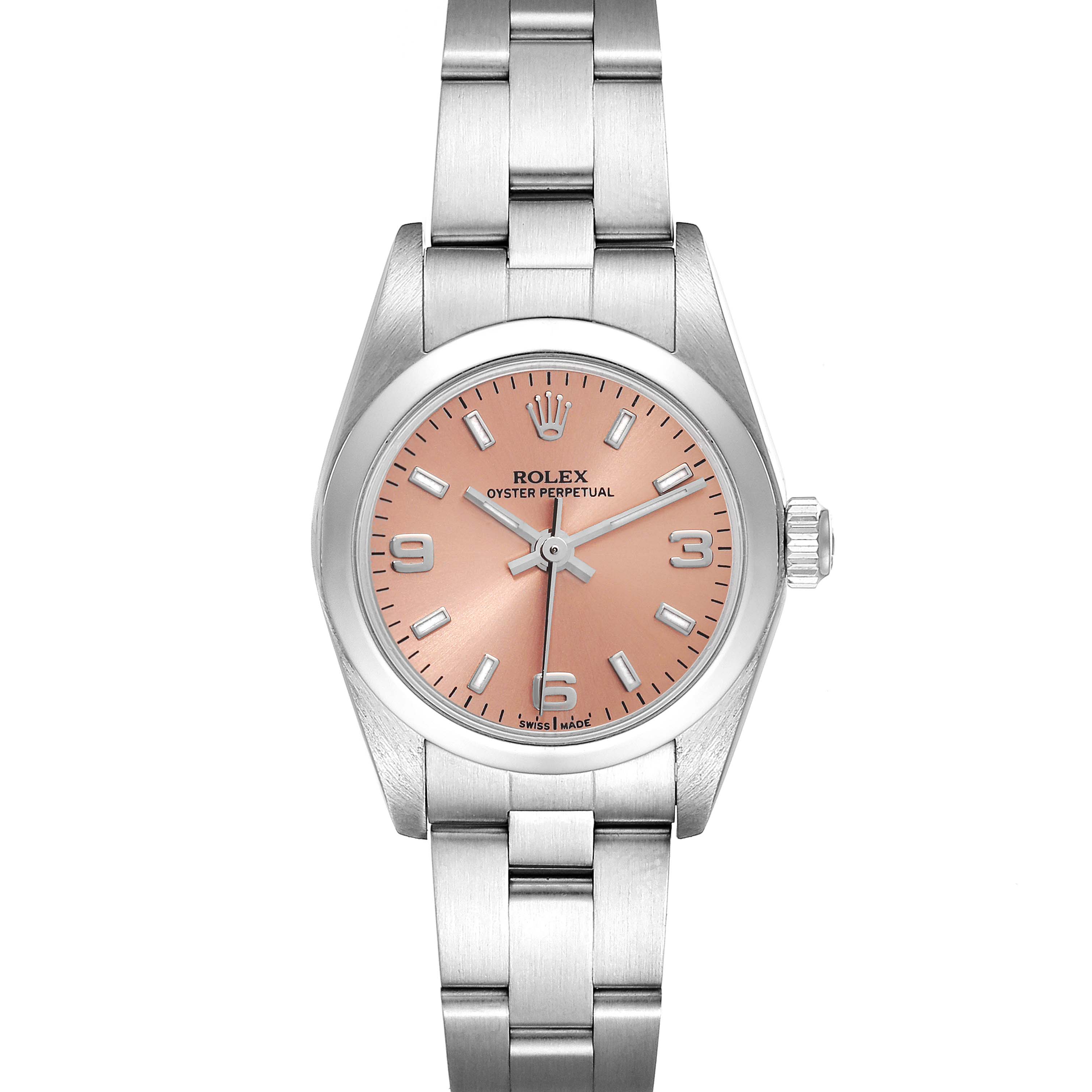 This Rolex Oyster Perpetual 76080 Women
s Stainless Steel Pink Dial 76080 Women
s Stainless Steel Pink Dial watch is shown from a top-down angle, highlighting its dial, case, and bracelet.