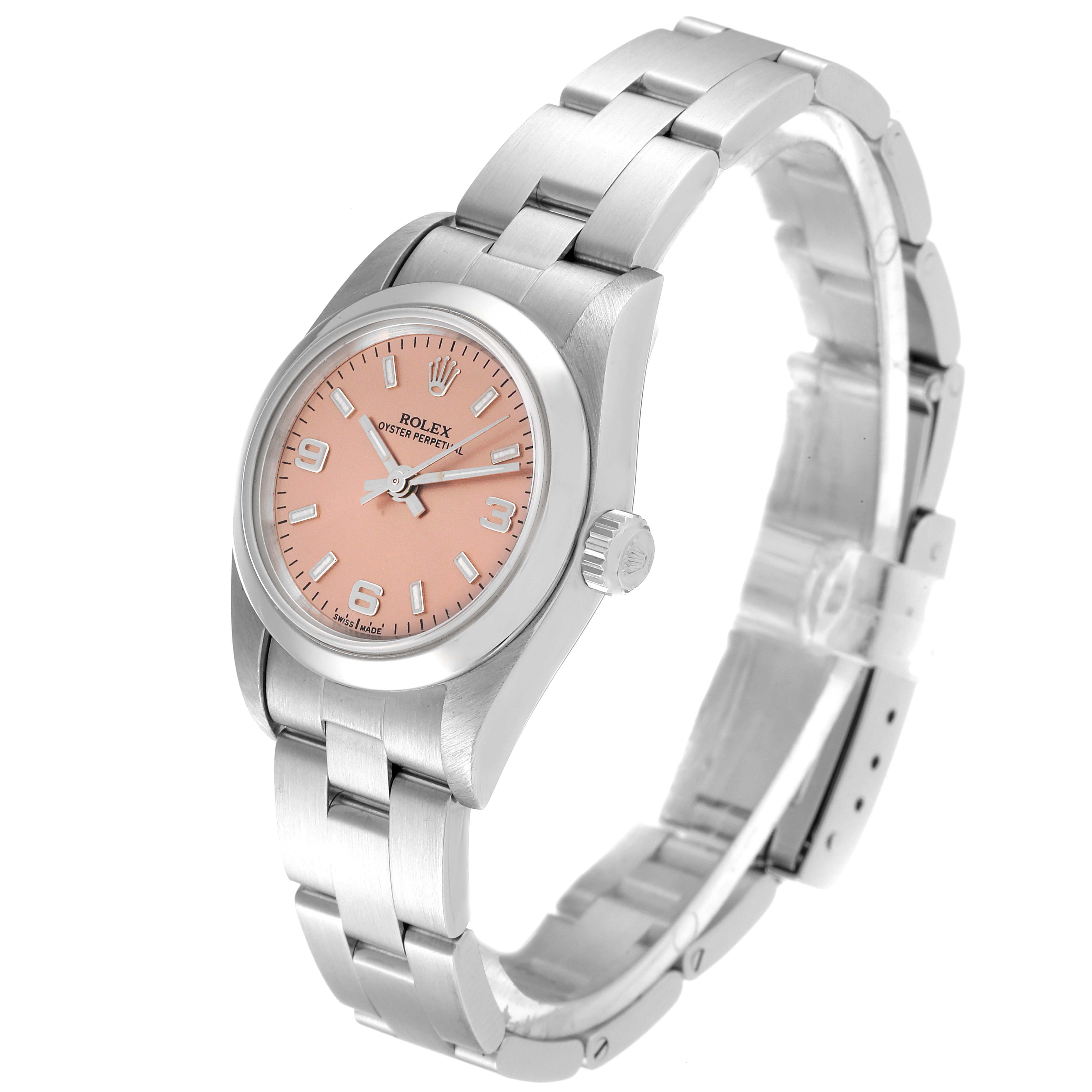 The Rolex Oyster Perpetual 76080 Women
s Stainless Steel Pink Dial 76080 Women
s Stainless Steel Pink Dial watch is shown at a three-quarter angle, displaying the face, crown, and bracelet.
