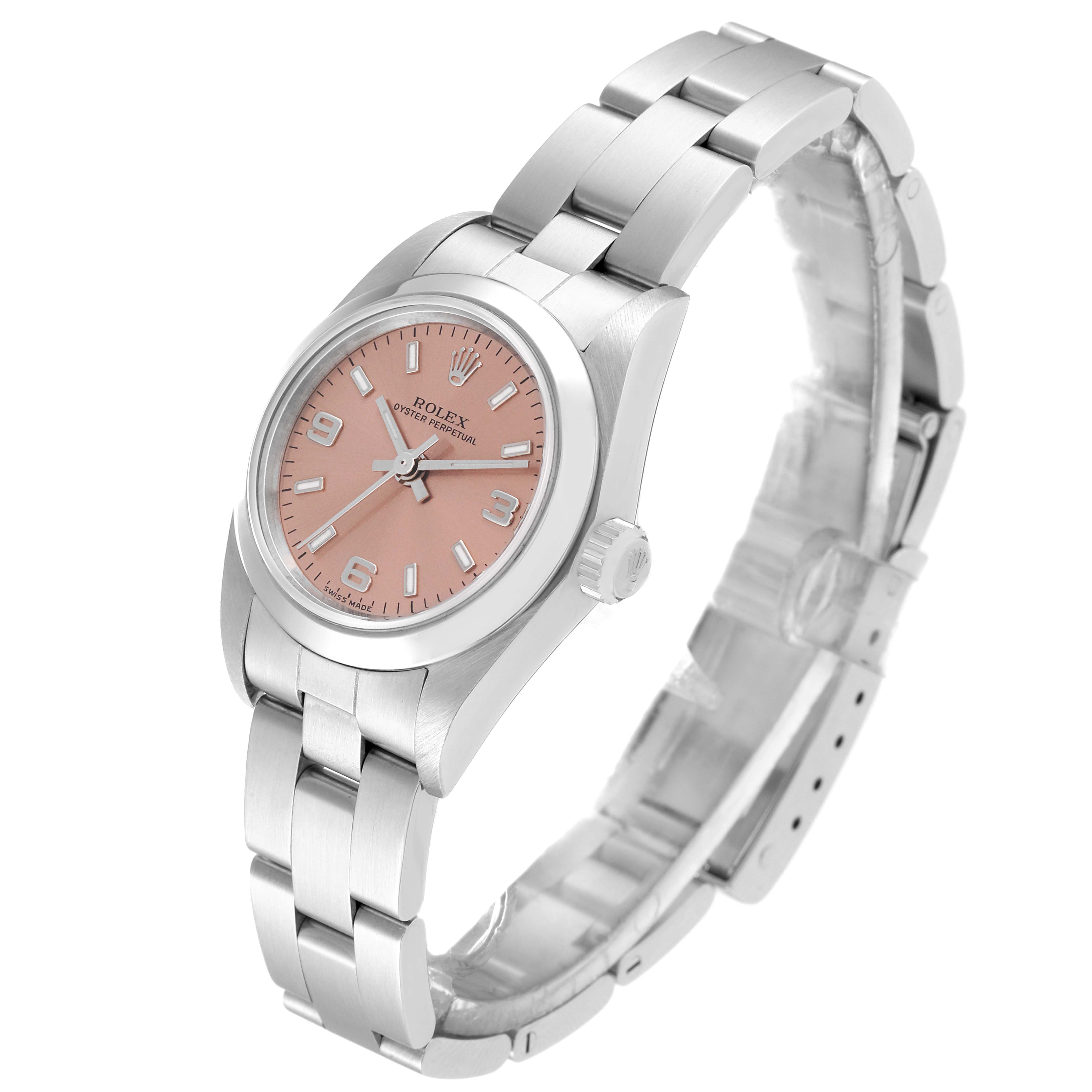 This image shows a Rolex Oyster Perpetual 76080 Women
s Stainless Steel Pink Dial 76080 Women
s Stainless Steel Pink Dial watch angled from the front and slightly to the side, displaying the face, bezel, and bracelet.