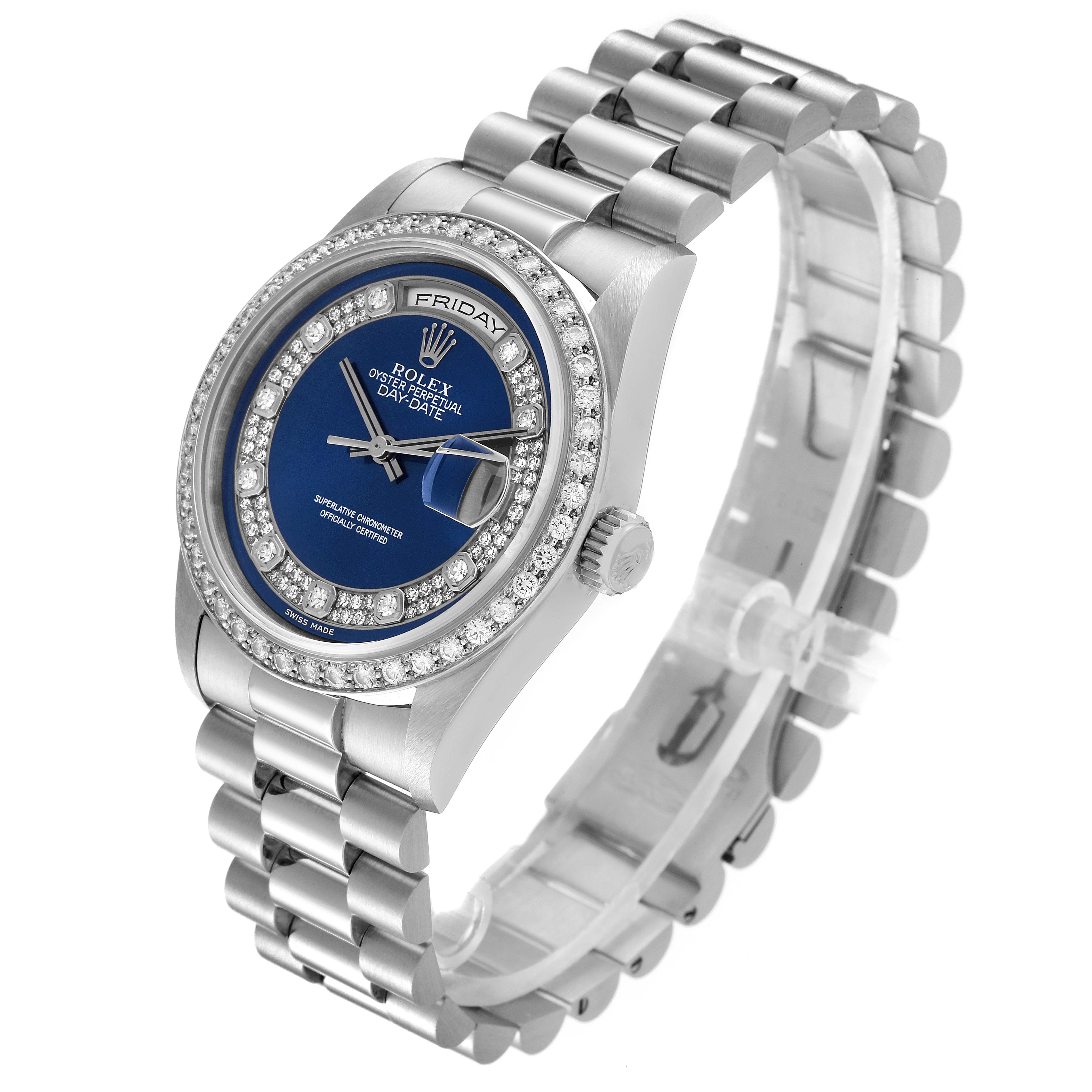 The Rolex President 18346 Men's Platinum Blue Dial 18346 Men's Platinum Blue Dial model watch is shown at a slight angle, displaying the face, bracelet, crown, and bezel adorned with diamonds.