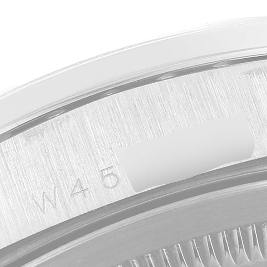 This image shows a close-up of the engraved serial number area on the case back of the Rolex President 18346 Men's Platinum Blue Dial 18346 Men's Platinum Blue Dial model watch.