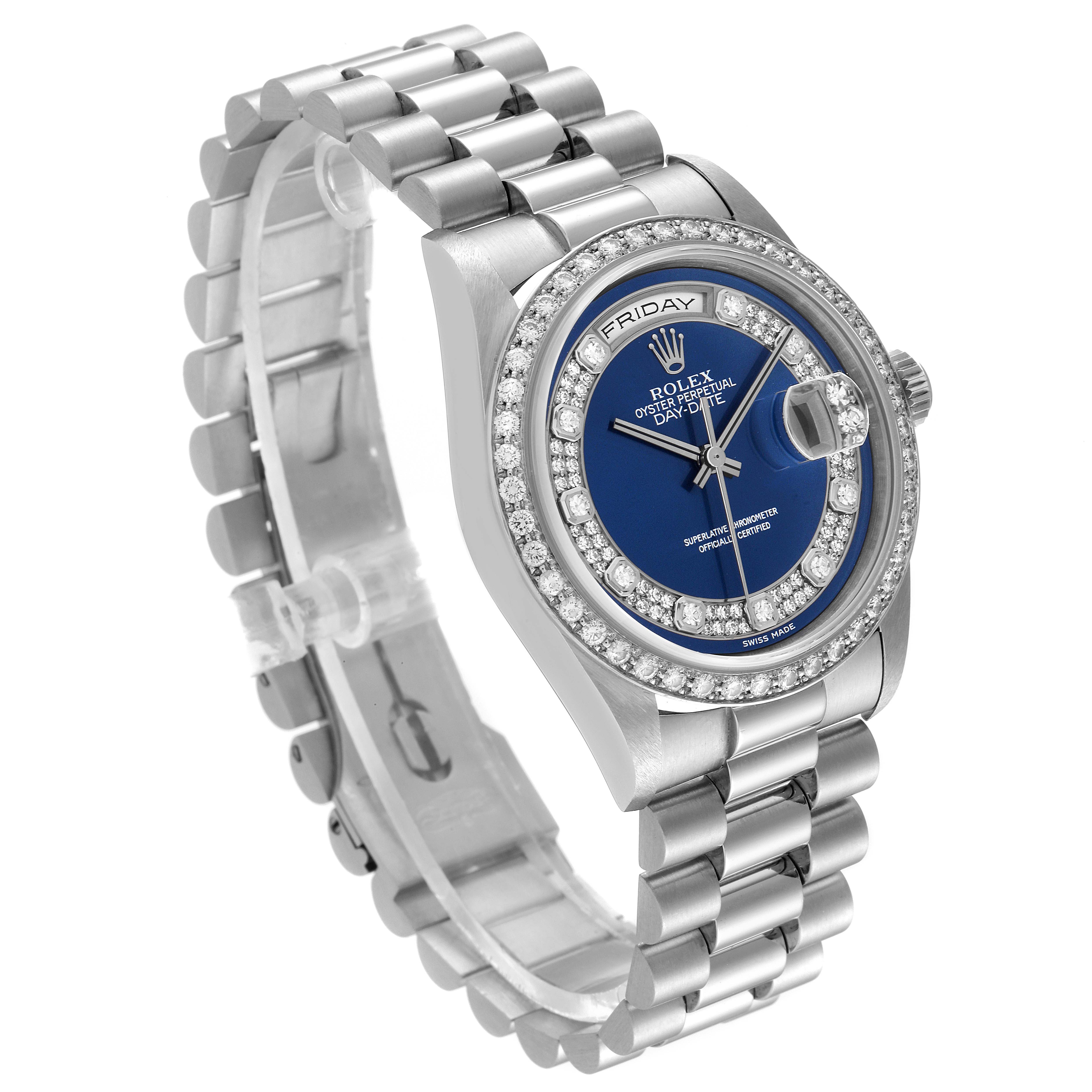 The Rolex President 18346 Men's Platinum Blue Dial 18346 Men's Platinum Blue Dial watch is shown at an oblique angle, displaying its blue dial, diamond bezel, and stainless steel bracelet.