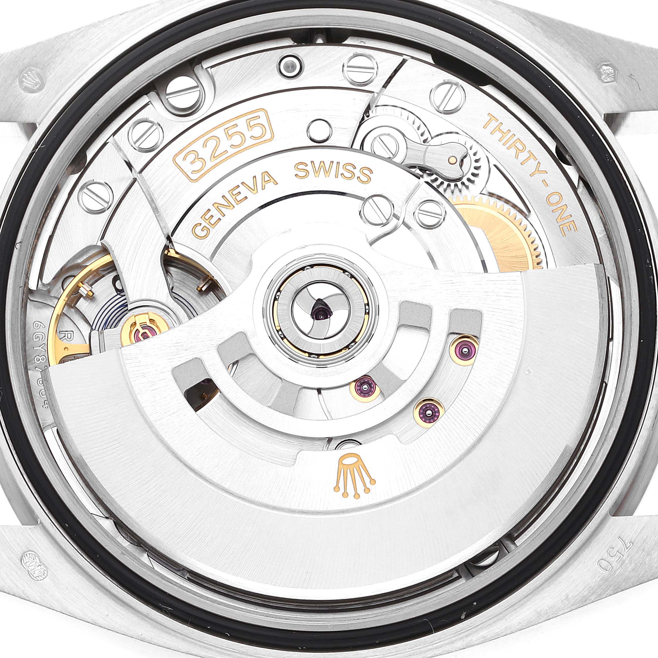 The image shows the intricate internal movement of a Rolex President 128239 Men's White Gold Blue Dial 128239 Men's White Gold Blue Dial model watch, highlighting the Swiss-made mechanism.