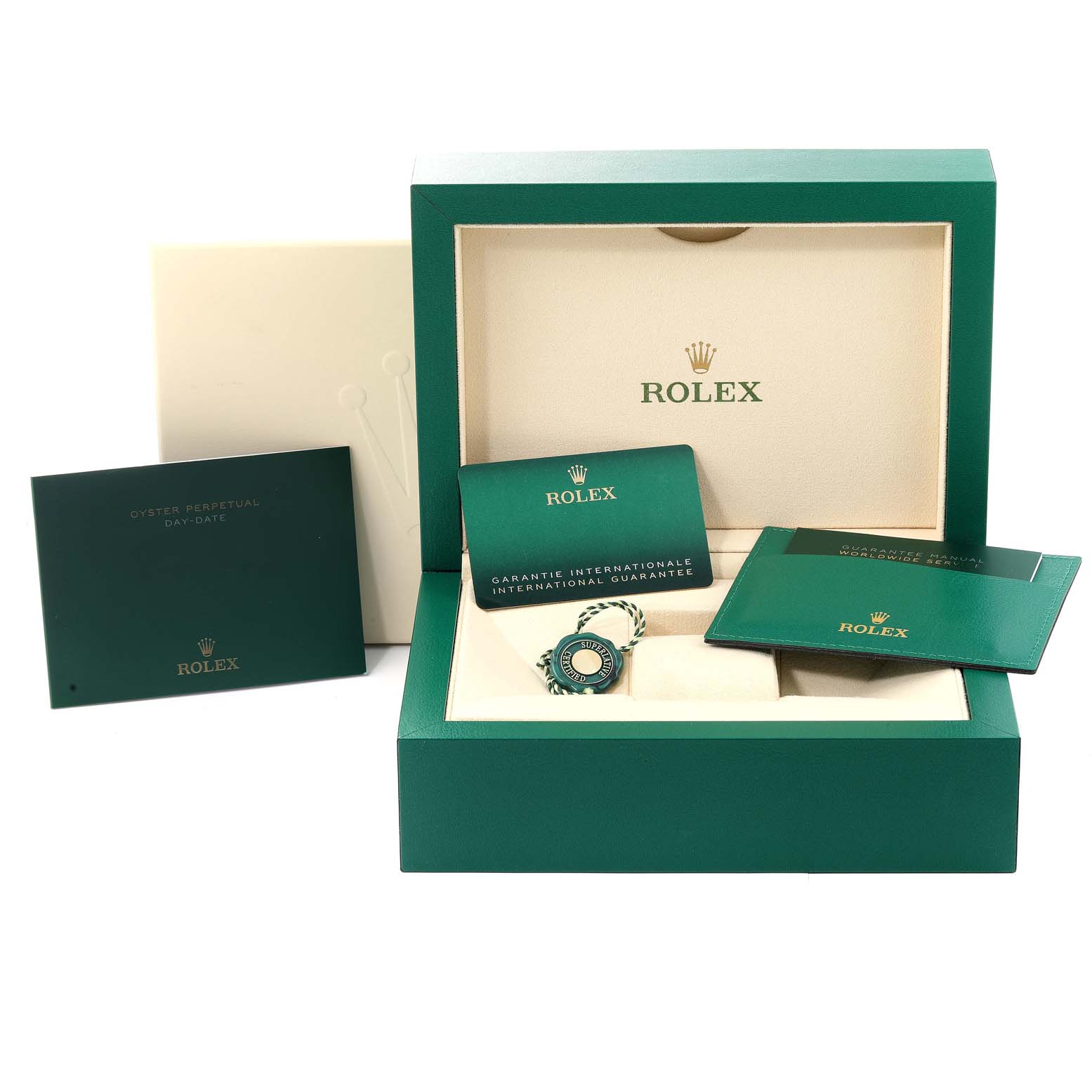 The image shows the packaging contents of a Rolex President 128239 Men's White Gold Blue Dial 128239 Men's White Gold Blue Dial model watch, including its box, manuals, documentation, and accessories.