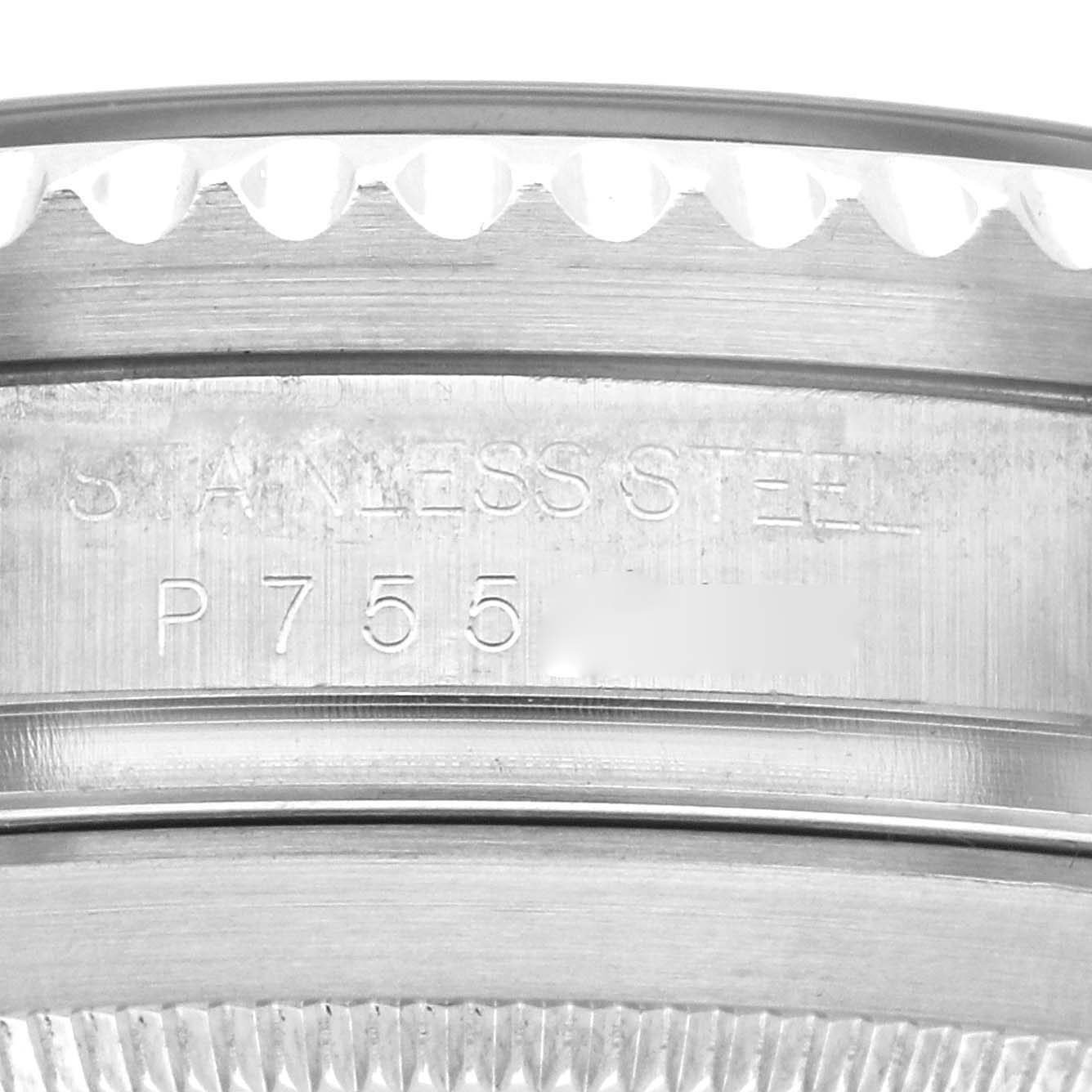 The image shows a close-up of the Rolex Sea-Dweller 16600T Men's Stainless Steel Black Dial 16600T Men's Stainless Steel Black Dial's bezel and case, highlighting the stainless steel engraving.