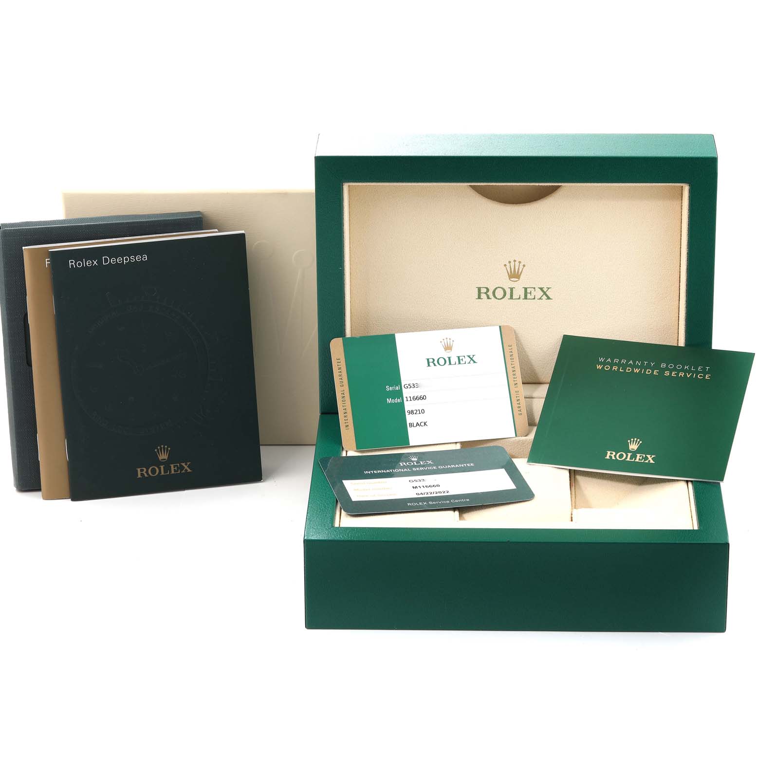 The image shows the accessories of a Rolex Sea-Dweller 116660 Men's Stainless Steel Black Dial 116660 Men's Stainless Steel Black Dial, including warranty cards, booklets, and the watch box.