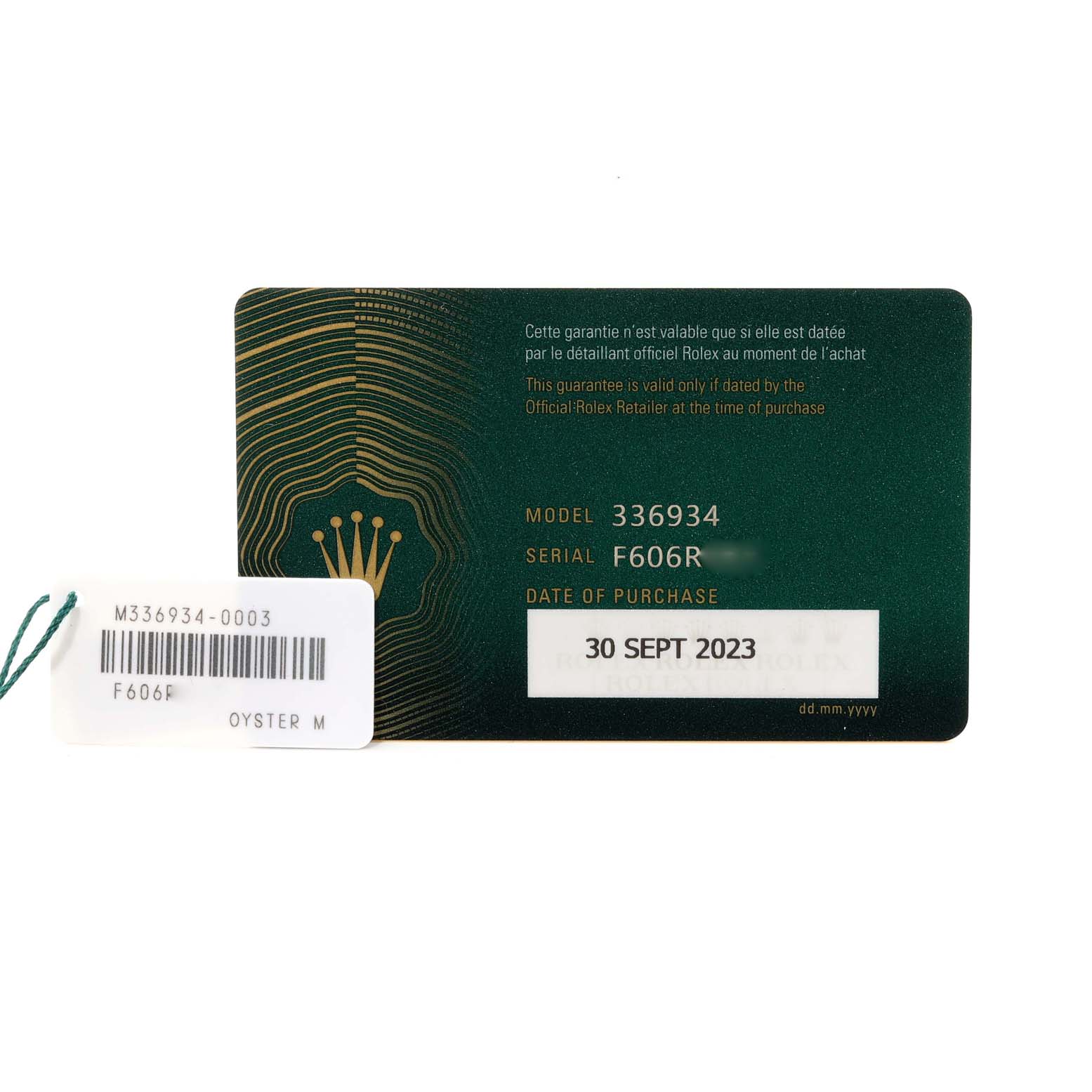 The image shows the guarantee card and tag for a Rolex Sky-Dweller 336934 Men
s Stainless Steel White Dial 336934 Men
s Stainless Steel White Dial model 336934, dated 30 SEPT 2023.