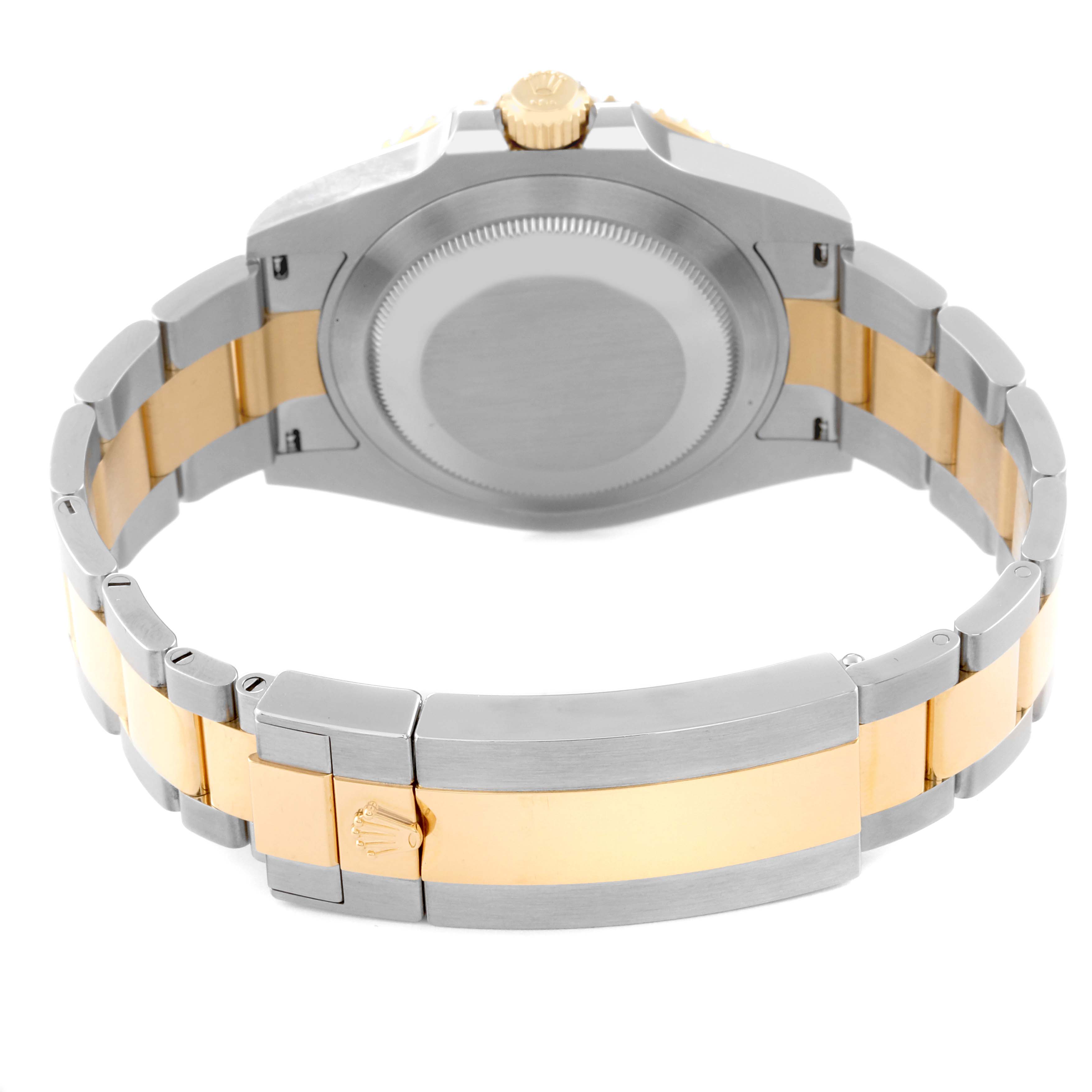 The image shows the back view of the Rolex Submariner 126613LB Men
s Steel and Gold (two tone) Blue Dial 126613LB Men
s Steel and Gold (two tone) Blue Dial with its case back and two-tone bracelet.