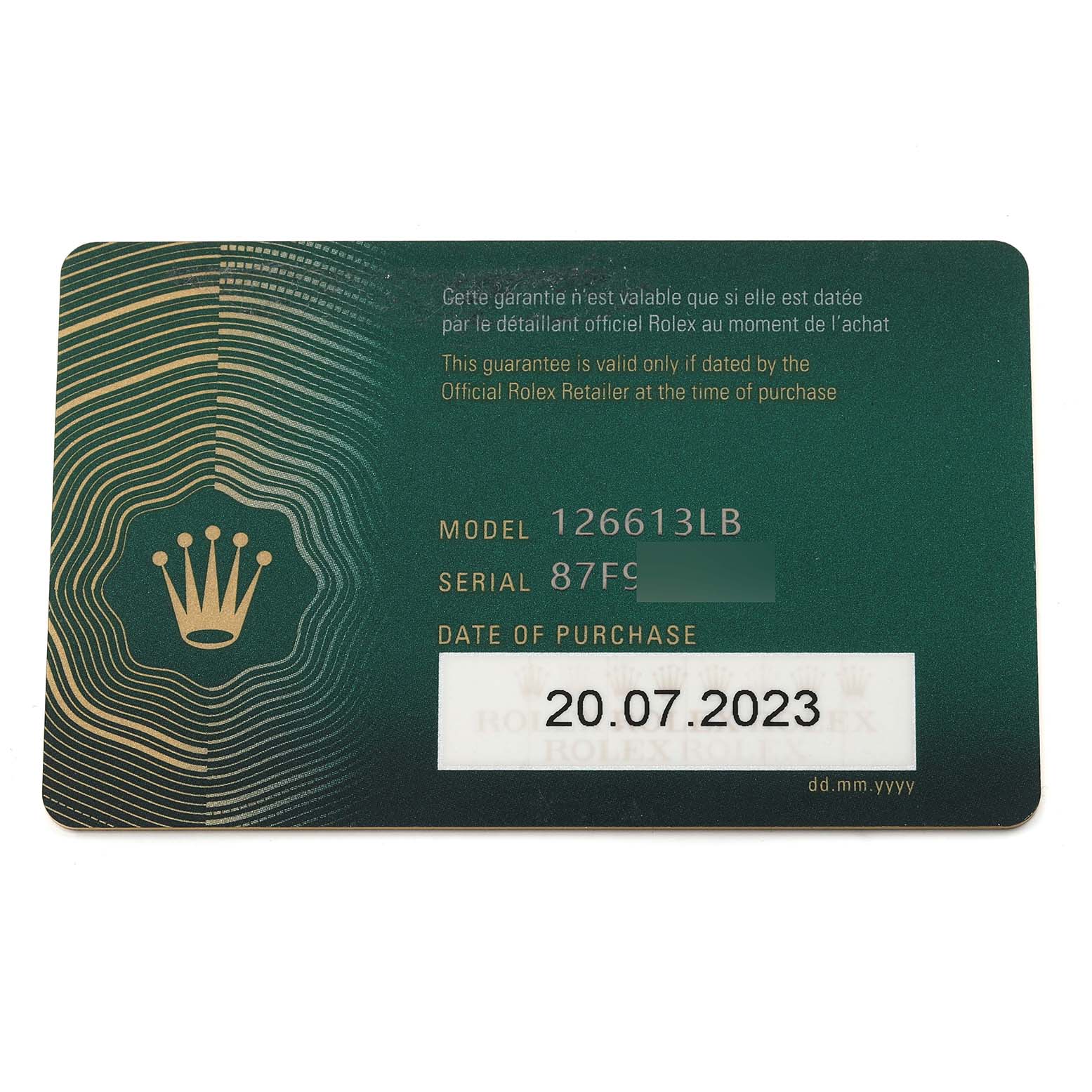 This image shows the guarantee card for the Rolex Submariner 126613LB Men
s Steel and Gold (two tone) Blue Dial 126613LB Men
s Steel and Gold (two tone) Blue Dial model 126613LB with the purchase date labeled as 20.07.2023.
