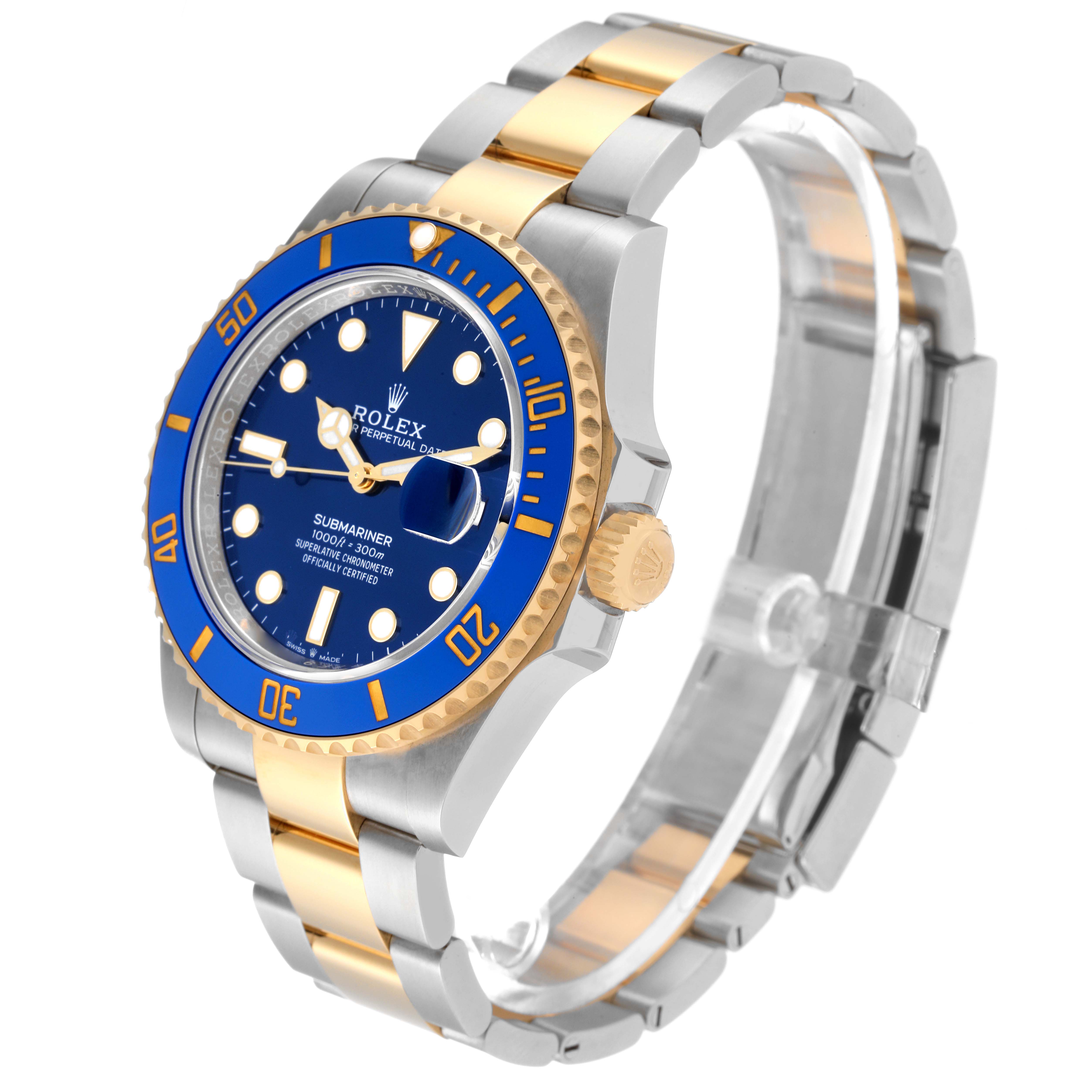 The image showcases a Rolex Submariner 126613LB Men
s Steel and Gold (two tone) Blue Dial 126613LB Men
s Steel and Gold (two tone) Blue Dial watch from a three-quarter angle, highlighting its blue dial, bezel, and two-tone bracelet.