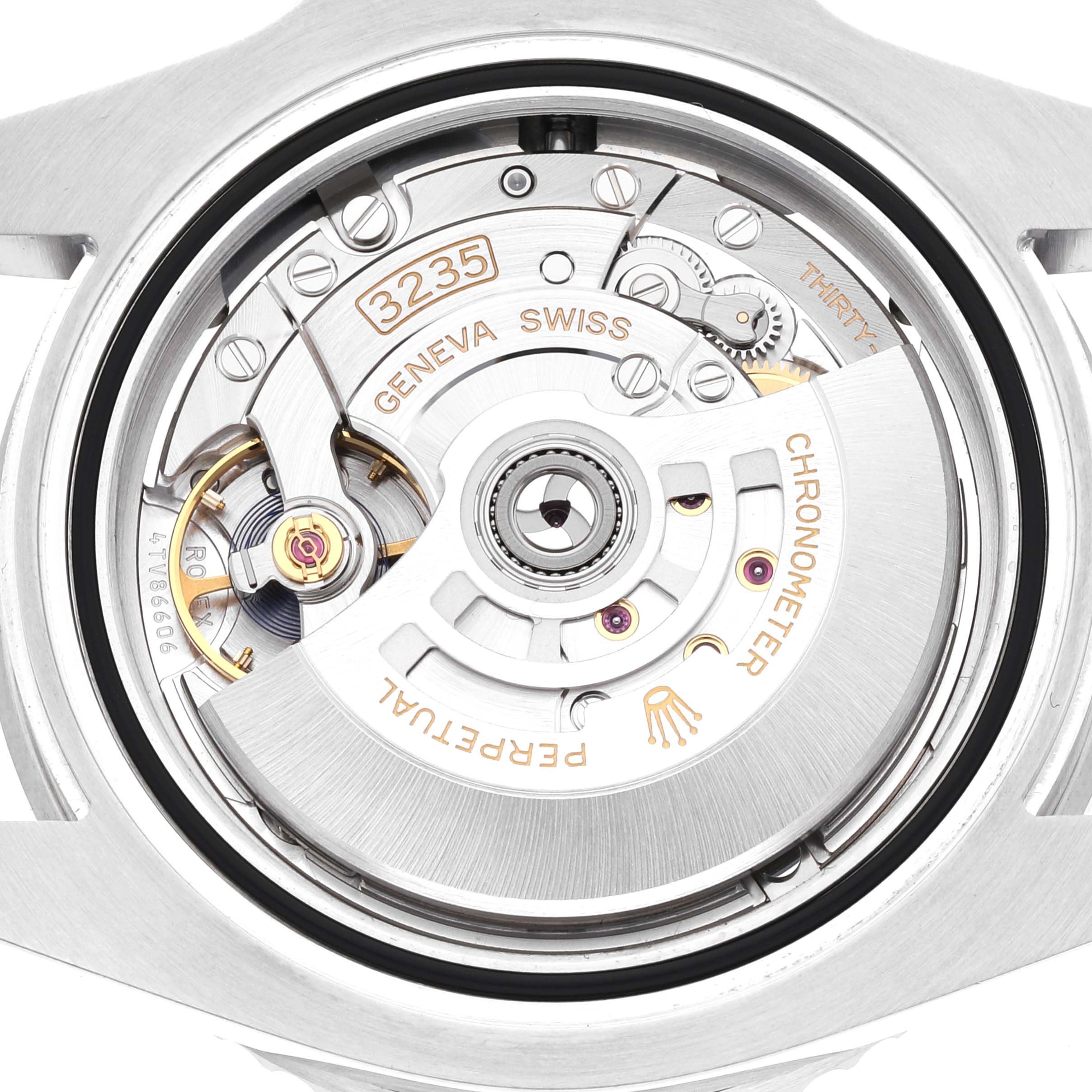 The image shows the movement of a Rolex Submariner 126610LN Men
s Stainless Steel Black Dial 126610LN Men
s Stainless Steel Black Dial watch, specifically the Caliber 3235 mechanism, viewed from the back.