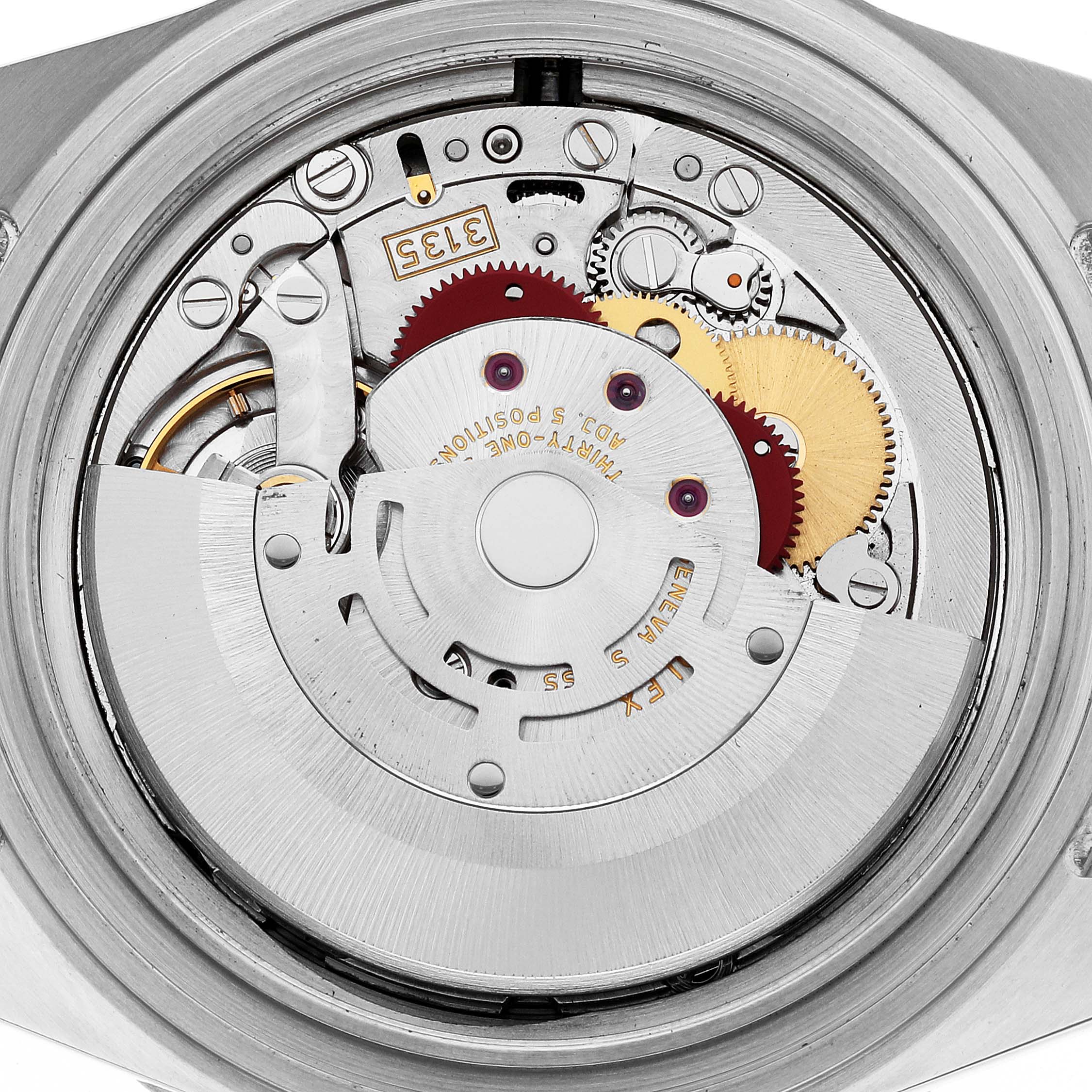 The image shows the inner mechanical movement components of a Rolex Submariner 16613 Men
s Steel and Gold (two tone) Blue Dial 16613 Men
s Steel and Gold (two tone) Blue Dial watch from a back angle.