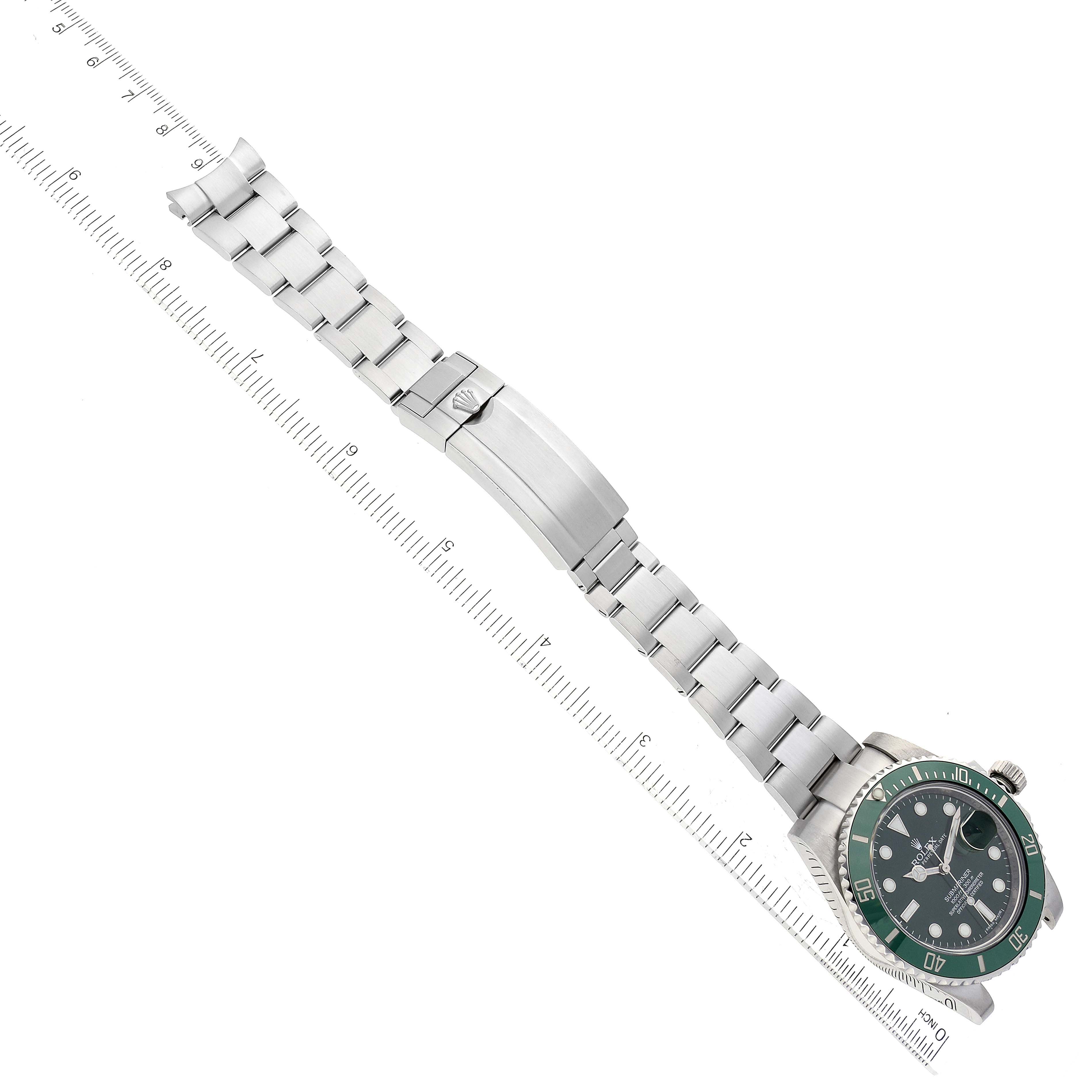The image shows a Rolex Submariner 116610LV Men's Stainless Steel Green Dial 116610LV Men's Stainless Steel Green Dial watch laid flat with its stainless steel bracelet and clasp fully extended.