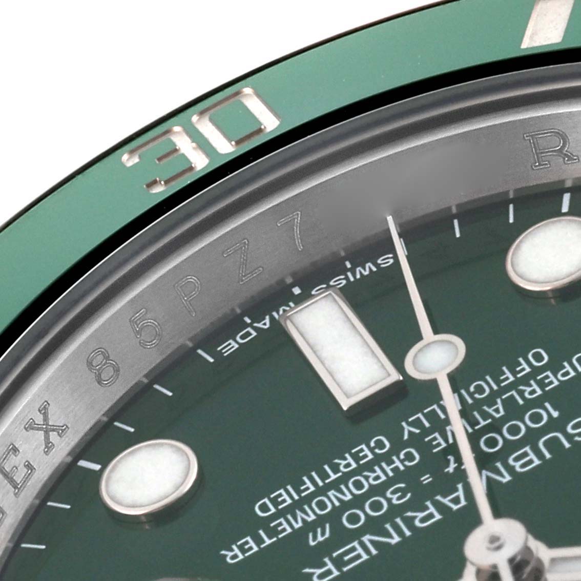The image shows a close-up of the bezel, part of the dial, and markers of a Rolex Submariner 116610LV Men's Stainless Steel Green Dial 116610LV Men's Stainless Steel Green Dial watch.