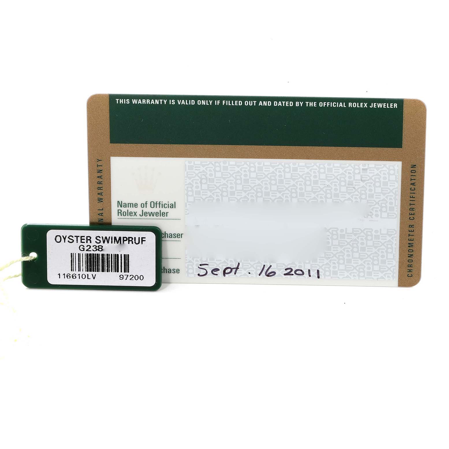 The image shows the warranty card and hang tag for a Rolex Submariner 116610LV Men
s Stainless Steel Green Dial 116610LV Men
s Stainless Steel Green Dial watch, model 116610LV.