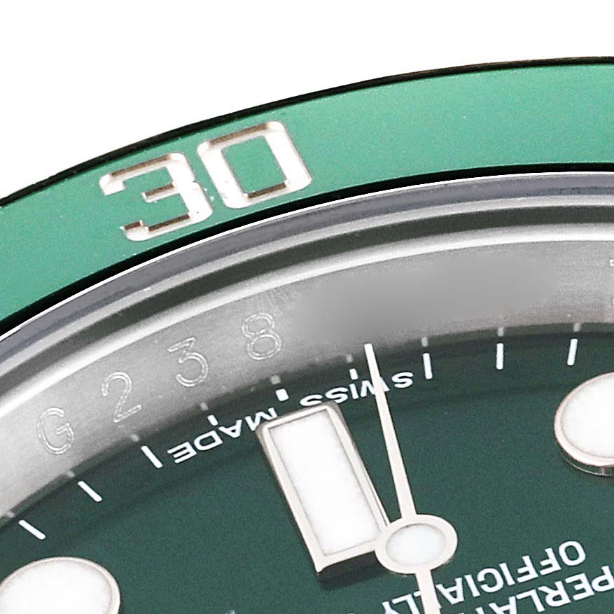 The image shows a close-up of the bezel, dial, and minute markers of a Rolex Submariner 116610LV Men
s Stainless Steel Green Dial 116610LV Men
s Stainless Steel Green Dial watch.