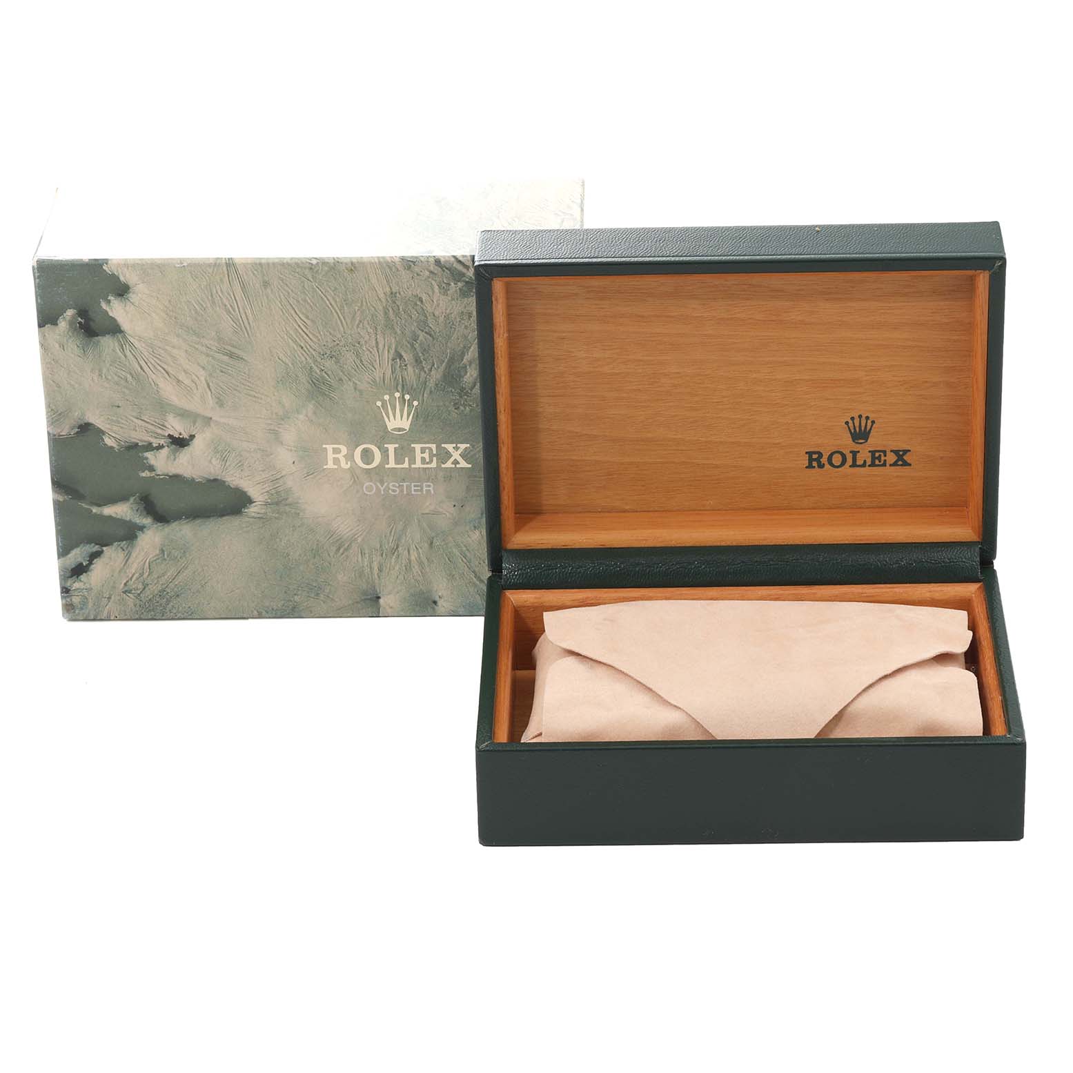 The image shows an open Rolex box for a Submariner model, displaying its interior with a suede case inside.