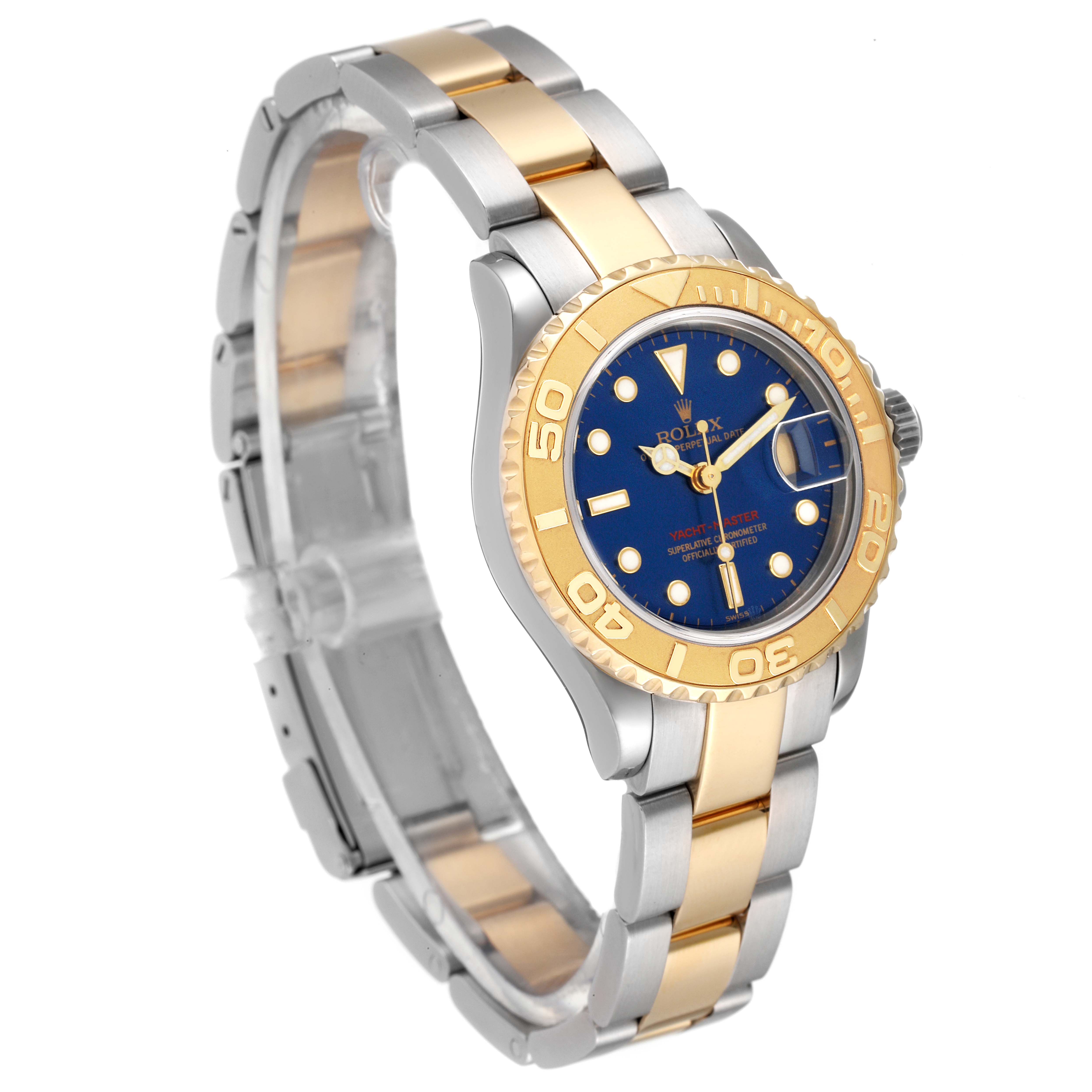 This Rolex Yacht-Master 169623 Women's Steel and Gold (two tone) Blue Dial 169623 Women's Steel and Gold (two tone) Blue Dial watch is angled to show the face, bezel, and strap, which features a blue dial and a two-tone metal band.