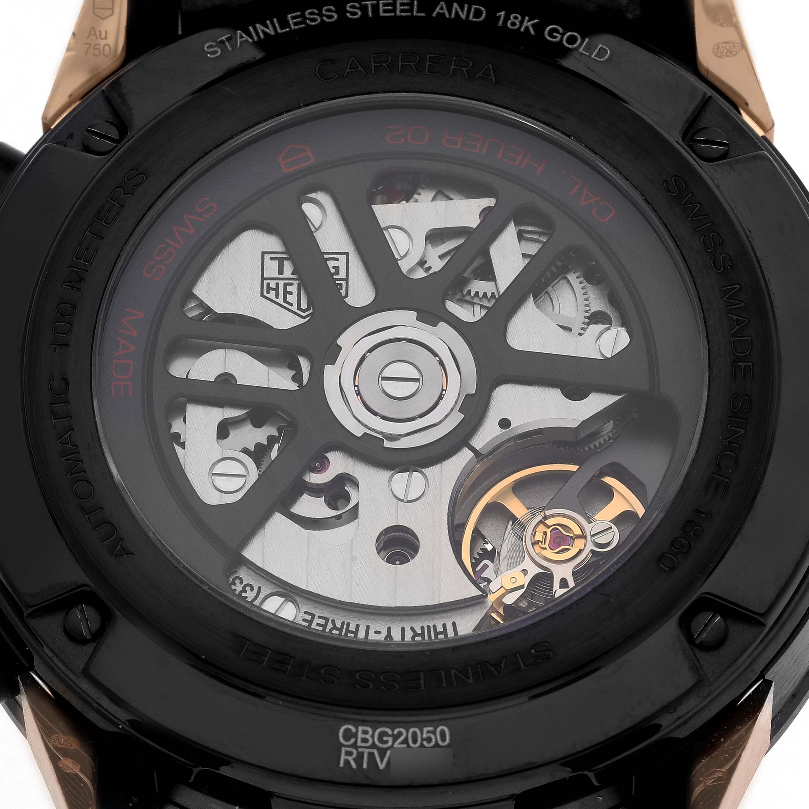 The image shows the back of a Tag Heuer Carrera CAR2050.FC6426 Men's Steel and Gold (two tone) Black Dial CAR2050.FC6426 Men's Steel and Gold (two tone) Black Dial watch, highlighting its exposed movement and intricate mechanism.