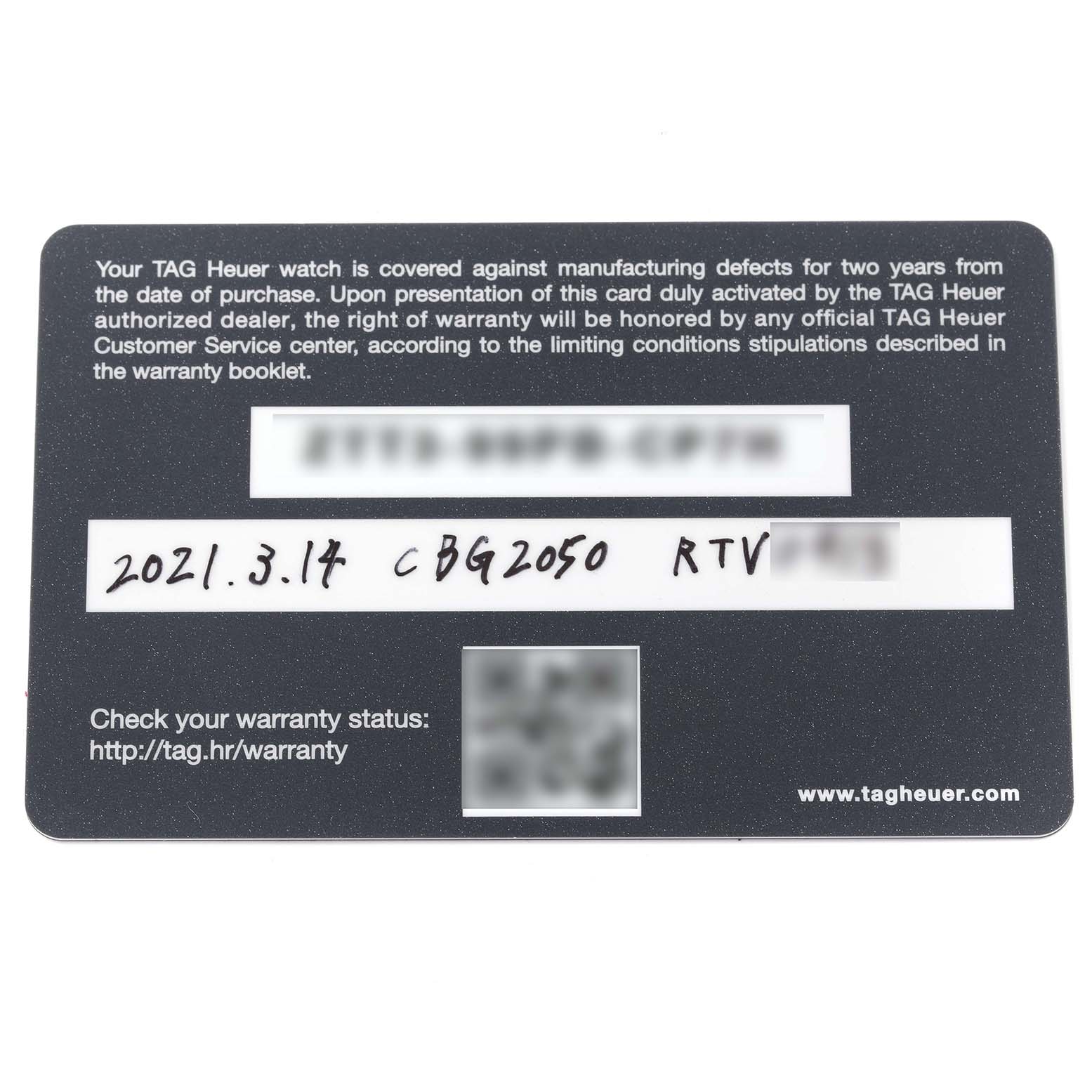 The image shows a Tag Heuer Carrera CAR2050.FC6426 Men's Steel and Gold (two tone) Black Dial CAR2050.FC6426 Men's Steel and Gold (two tone) Black Dial model warranty card from a top-down angle.