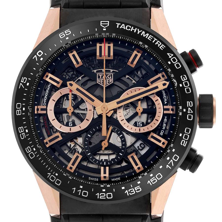 The image shows a TAG Heuer Carrera watch from a front angle, highlighting its dial, tachymeter, and chronograph features.