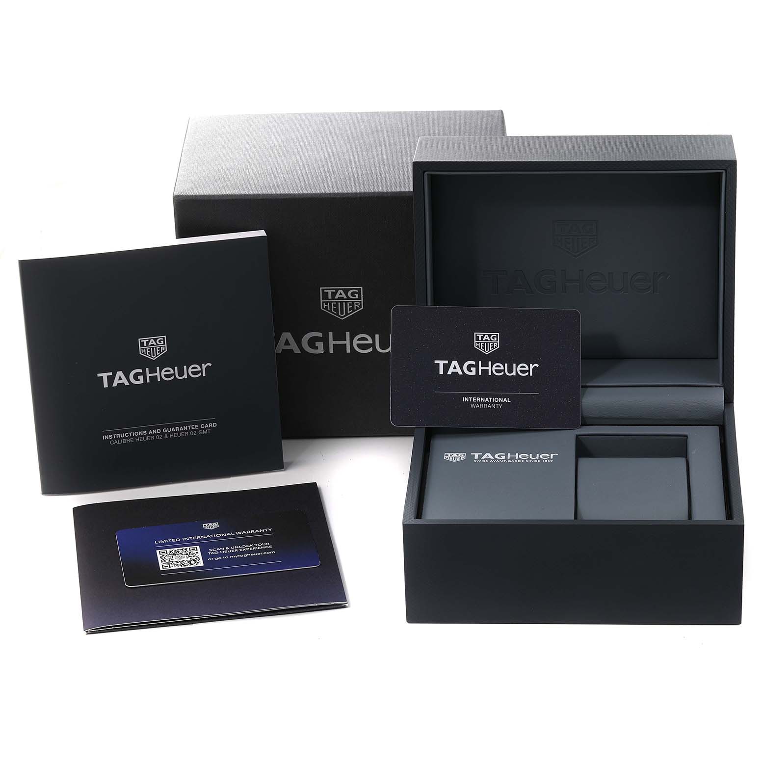 The image shows the packaging, warranty card, and instruction booklet for a Tag Heuer Carrera CBG2A1Z.BA0658 Men's Stainless Steel Transparent Dial CBG2A1Z.BA0658 Men's Stainless Steel Transparent Dial model watch.