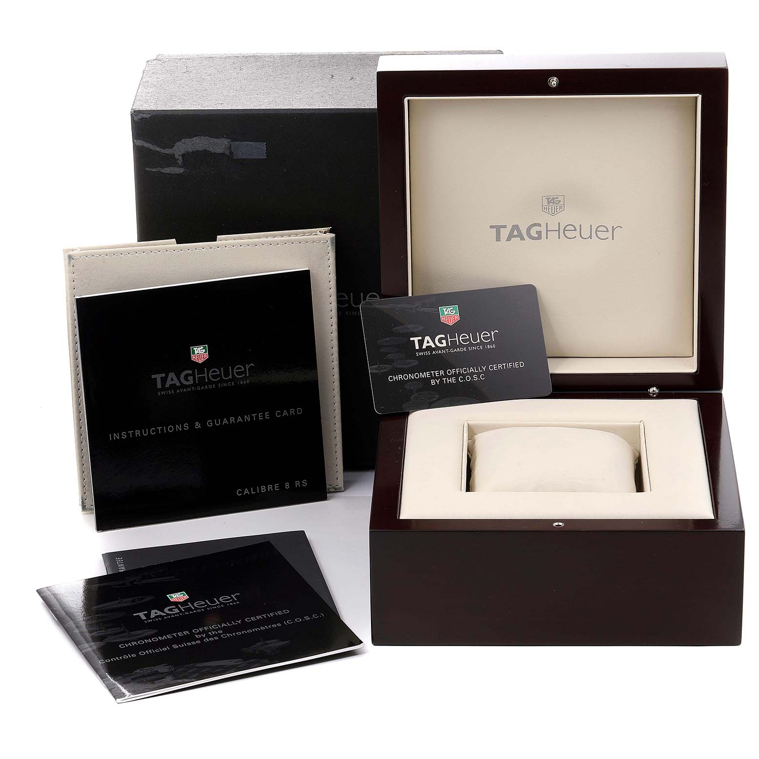 The image shows the packaging, instruction manual, guarantee card, and presentation box for the Tag Heuer Carrera WAV5111.BA0901 Men
s Stainless Steel Black Dial WAV5111.BA0901 Men
s Stainless Steel Black Dial watch.