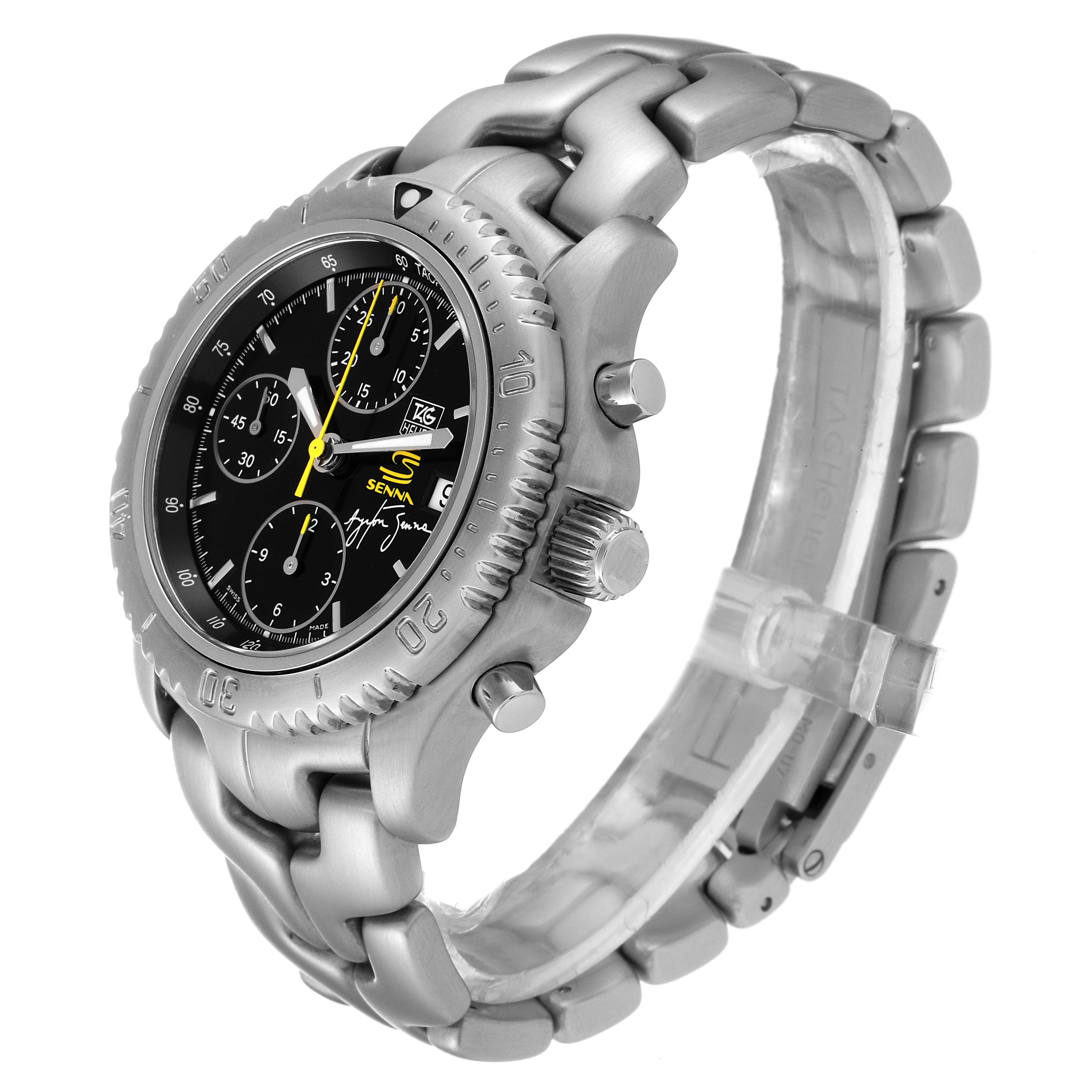 The image shows a Tag Heuer Link model watch from a three-quarter front angle, highlighting the dial, bezel, and bracelet.
