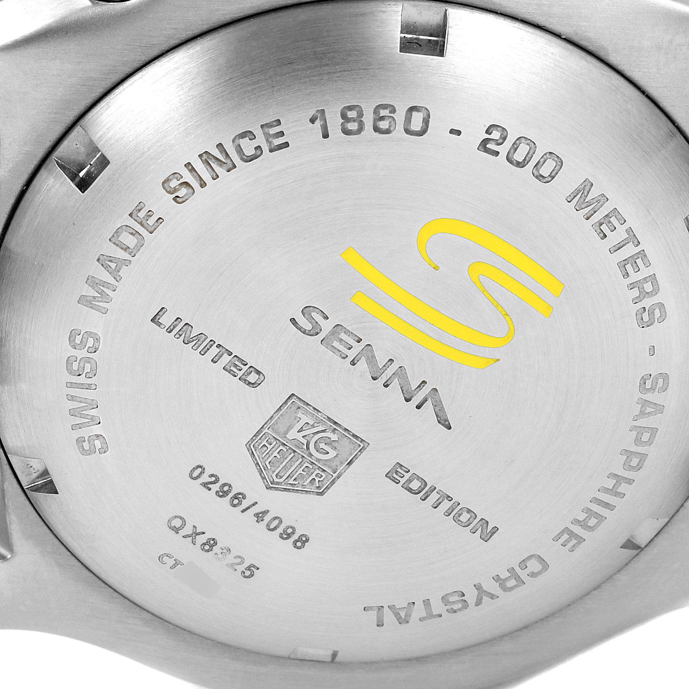 The image shows the back case of the Tag Heuer Link model watch, featuring the inscriptions and logos.