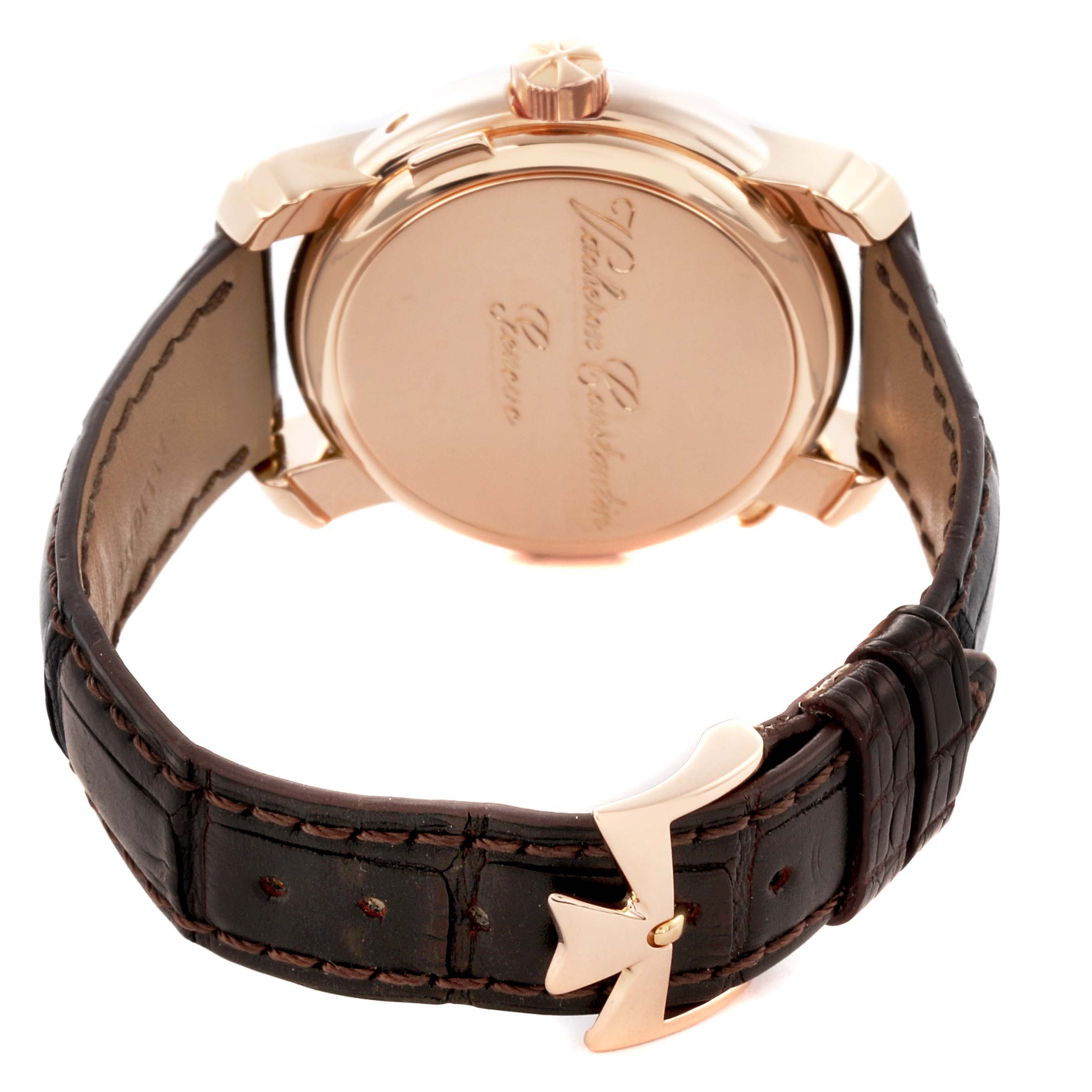 The image shows the back of a Vacheron Constantin Malte 42005 Men's Rose Gold Silver Dial 42005 Men's Rose Gold Silver Dial watch, featuring the case back, crown, and leather strap with a distinctive clasp.