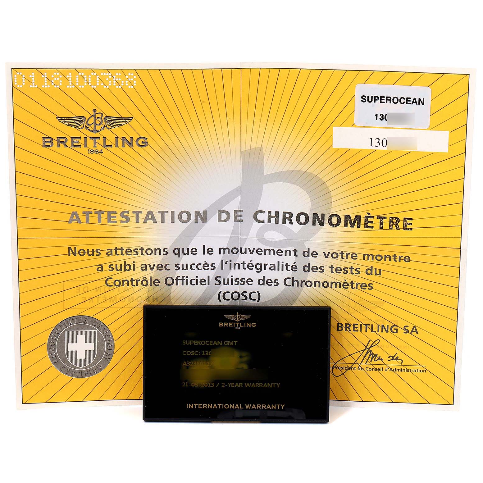 The image shows the warranty card and certificate for the Breitling Superocean A32380 Men's Stainless Steel Black Dial A32380 Men's Stainless Steel Black Dial model.