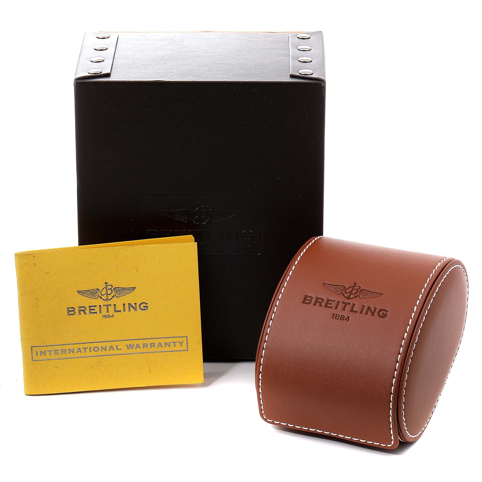 The image shows the packaging, a brown leather watch case, and an international warranty for the Breitling Superocean A17364 Men's Stainless Steel Black Dial A17364 Men's Stainless Steel Black Dial watch model.