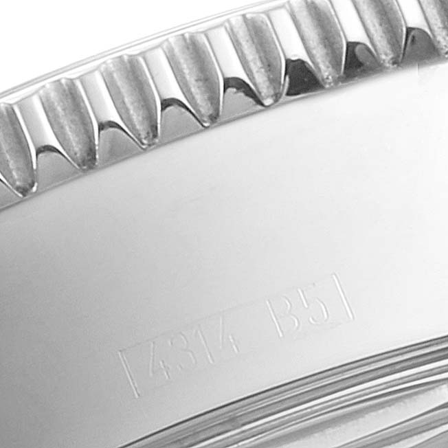 The image shows a close-up of the bezel and part of the case of the Breitling Superocean A17364 Men's Stainless Steel Black Dial A17364 Men's Stainless Steel Black Dial watch.