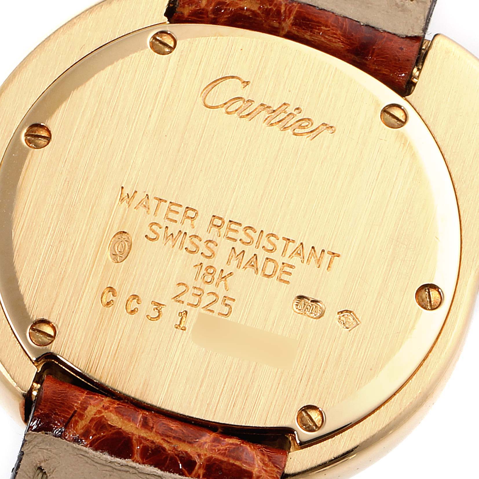 The image shows the back case of the Cartier Panthere 2325 Women's Yellow Gold Silver Dial 2325 Women's Yellow Gold Silver Dial model watch, highlighting its inscriptions and leather strap connections.