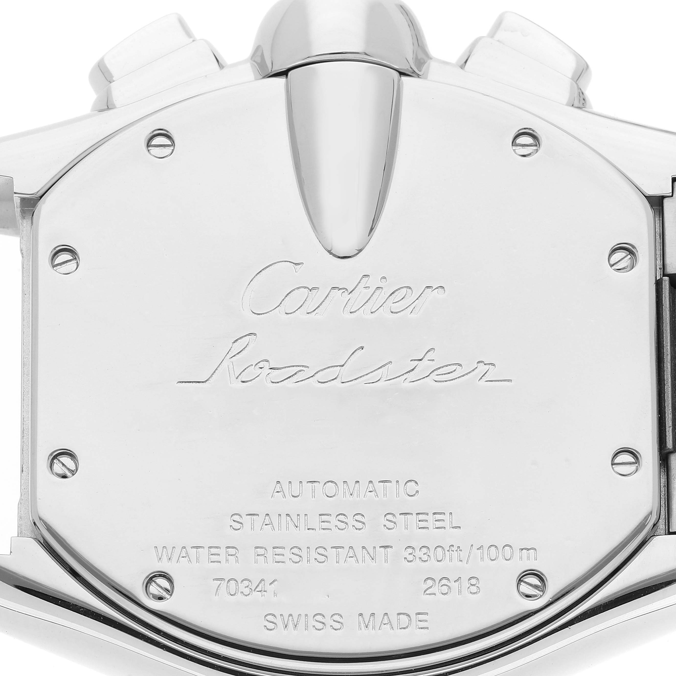 The image shows the back case of a Cartier Roadster W62020X6 Men's Stainless Steel Black Dial W62020X6 Men's Stainless Steel Black Dial watch with detailed engravings and screws visible.
