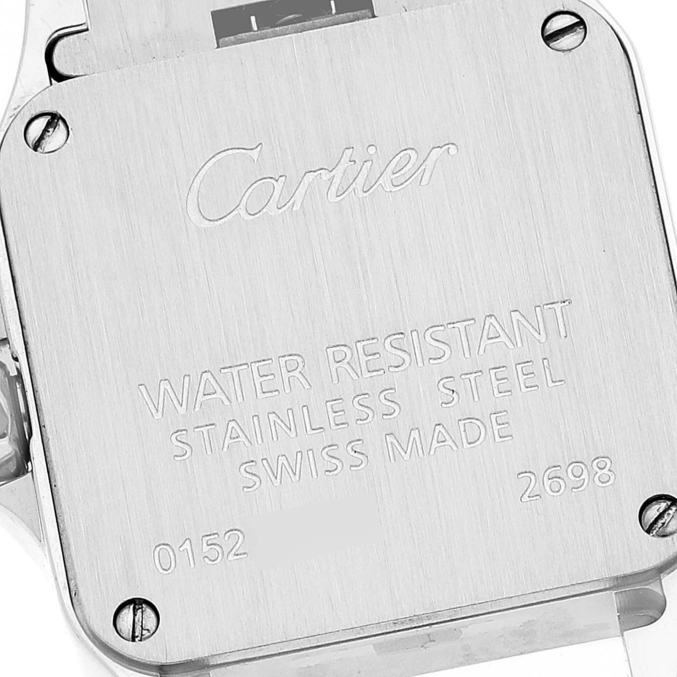 The image shows the back of a Cartier Santos Demoiselle W25064Z5 Women's Stainless Steel Silver Dial W25064Z5 Women's Stainless Steel Silver Dial model watch, highlighting its engravings and screws.