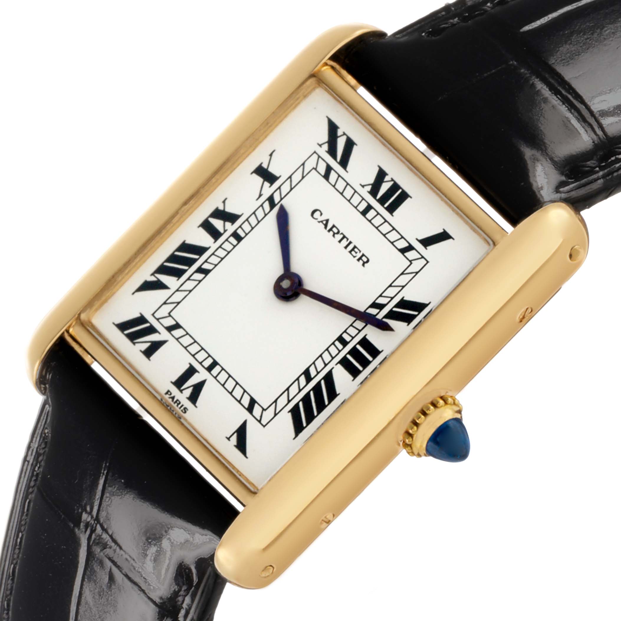 The Cartier Tank Classic Women's Yellow Gold White Dial watch is shown at an angled close-up, highlighting its Roman numeral dial and blue cabochon crown.